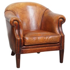 Fauteuil club en cuir de mouton