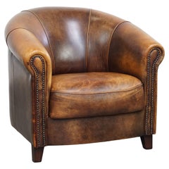 Fauteuil club en cuir de mouton