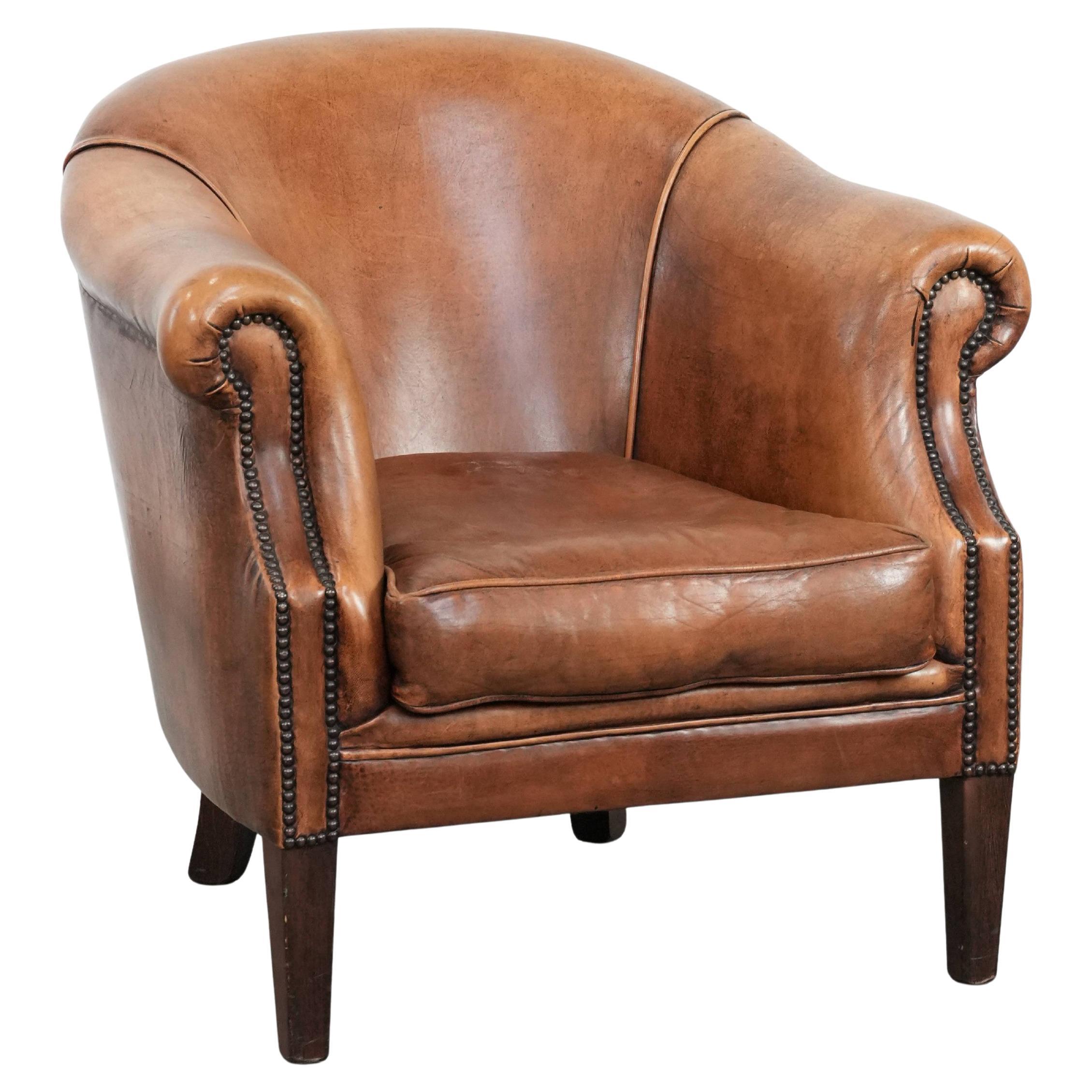 Sheepskin leather club chair with beautiful colours and comfortable seat For Sale