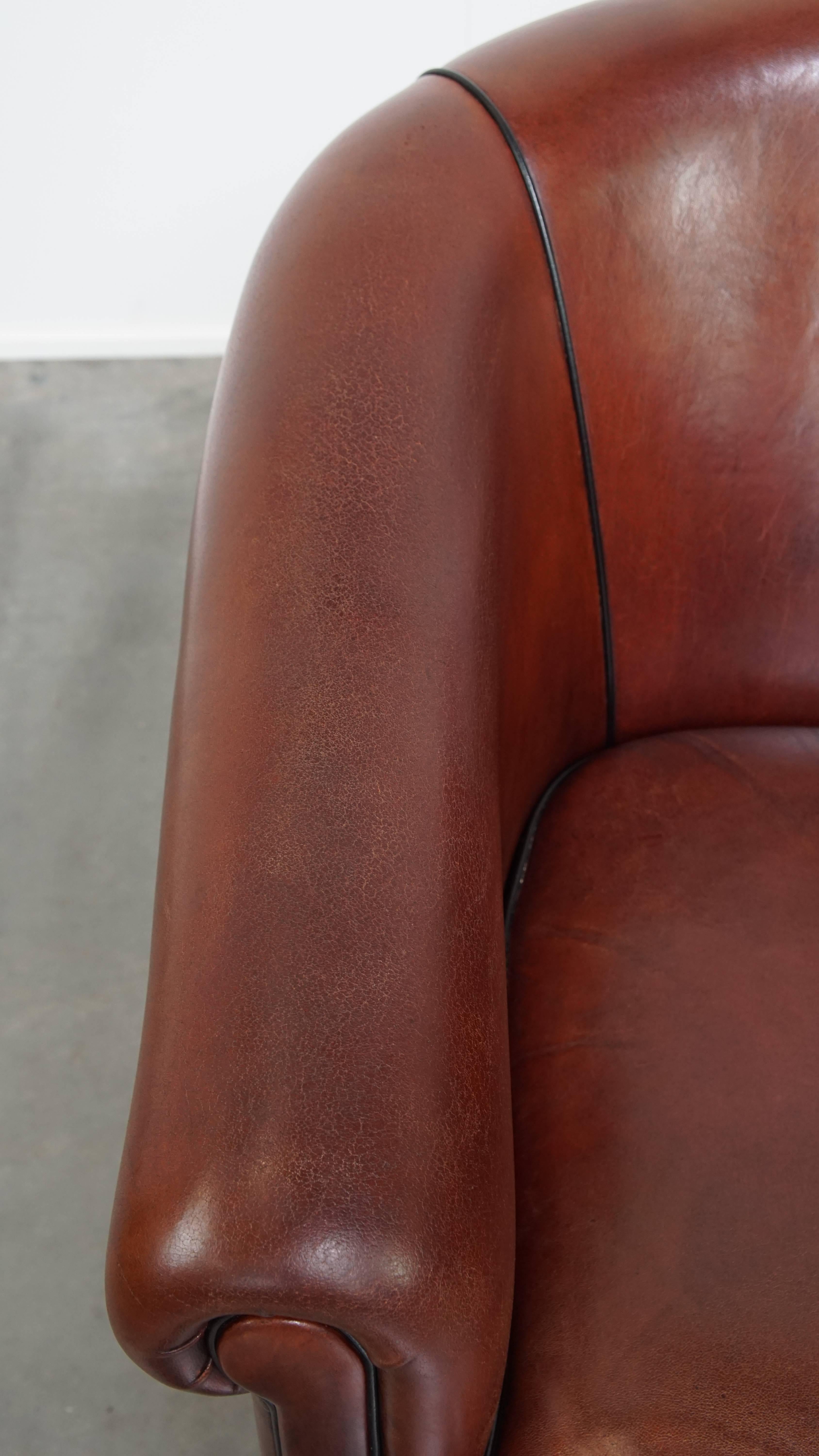 Silla Club de piel de oveja con ribete negro Cuero en venta
