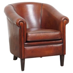 Silla Club de piel de oveja con ribete negro