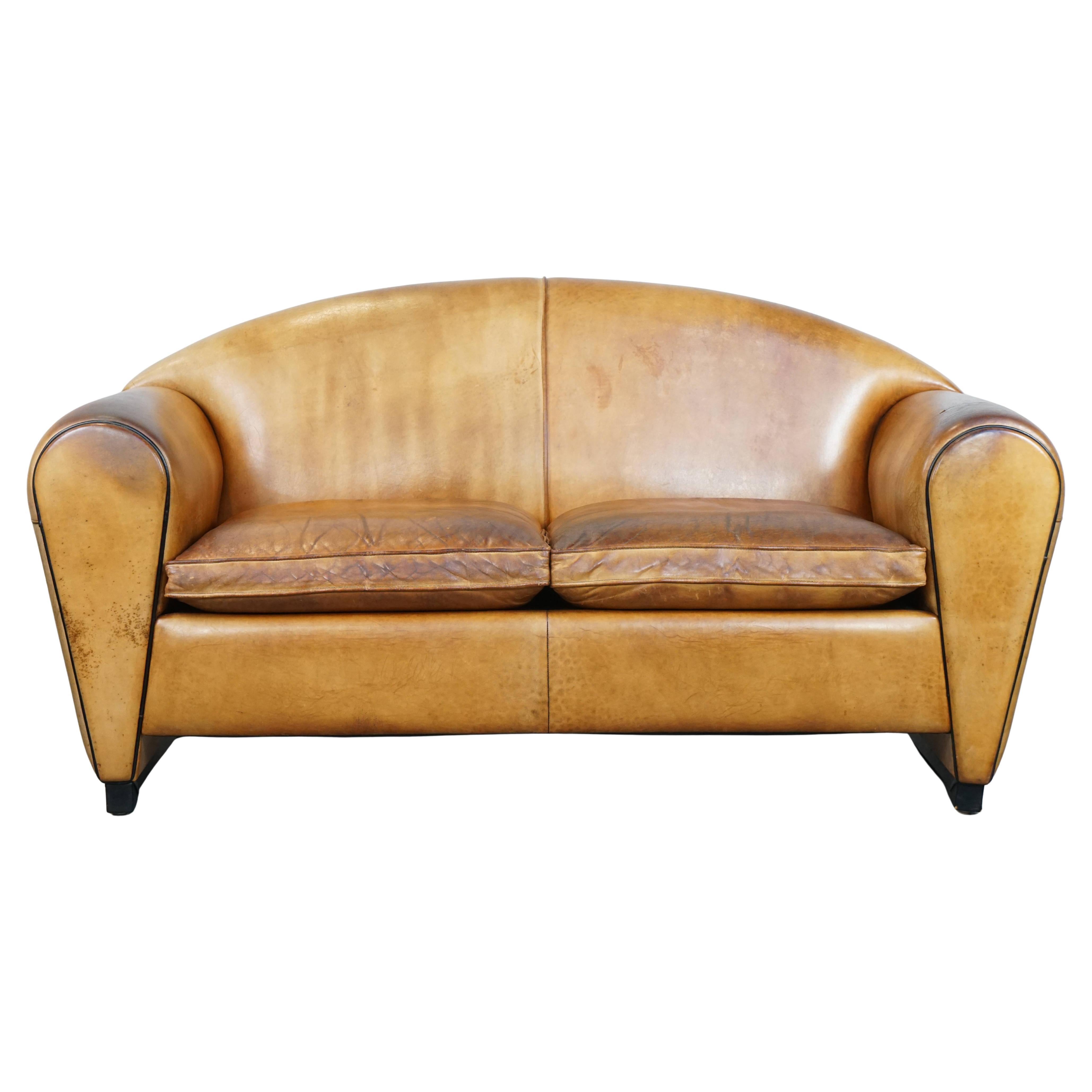 Sheepskin leather spacious 2-seater Art Deco design sofa from Bart van Bekhoven