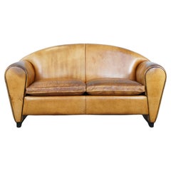 Sheepskin leather spacious 2-seater Art Deco design sofa from Bart van Bekhoven