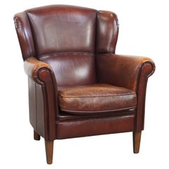 Sedia Wingback in pelle di pecora