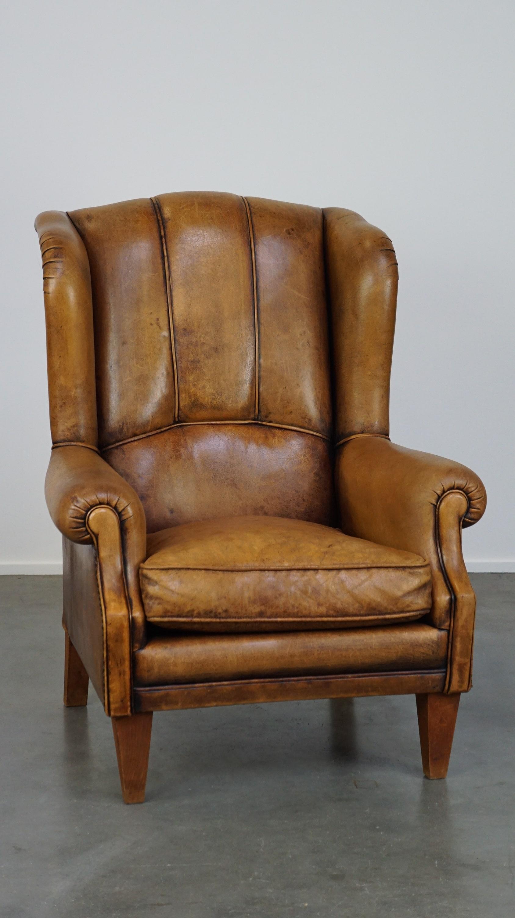 Sheepskin wing chair with a unique design and a beautiful patina For ...