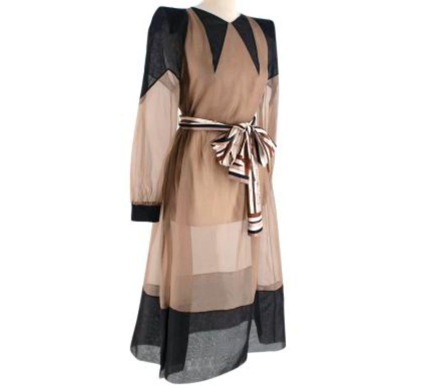 Fendi Sheer Beige Organza Belted Dress
 
 - Long-sleeve, ankle-length dress 
 - Sheer beige base fabric, with contrasting back collar, cuff and hem 
 - Concealed side zip closure 
 - Equestrian printed silk scarf belt
 - Unlined
 
 Materials 
 100%