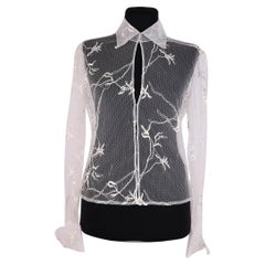 Sheer blouse by Gianni Versace.