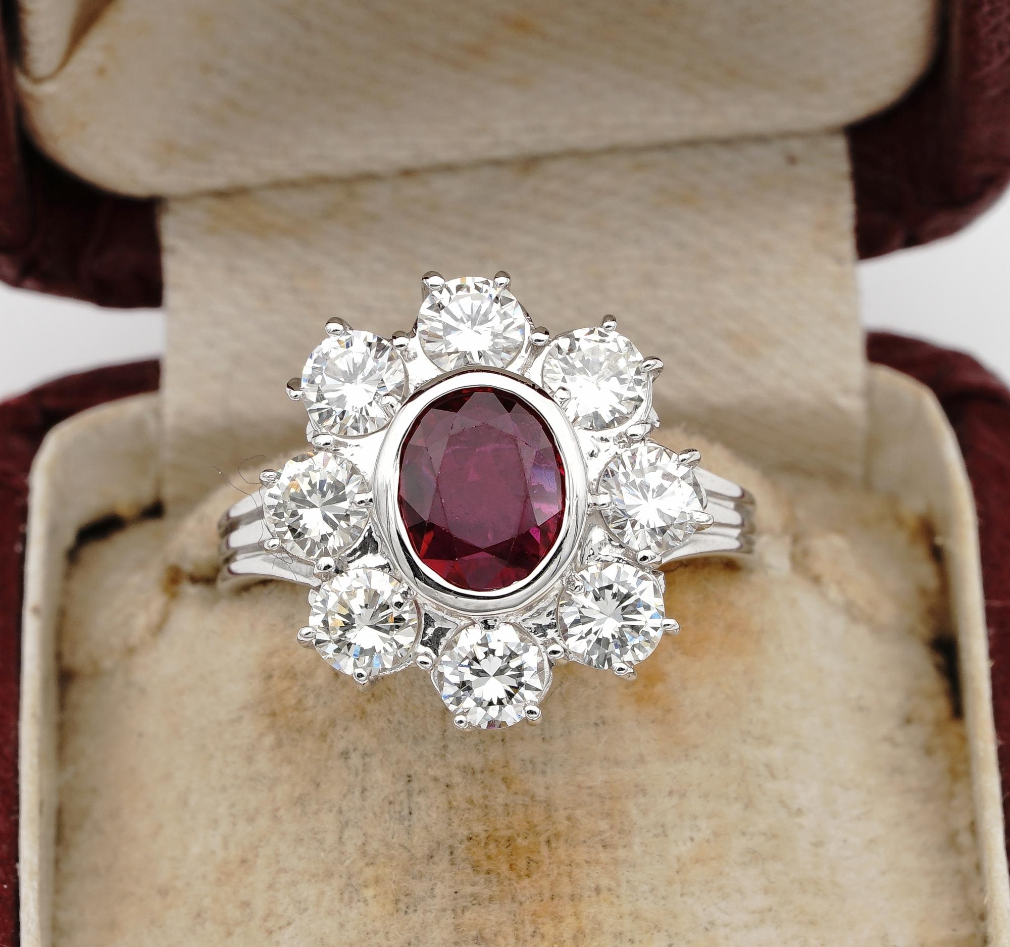 Passion into Light!

Magnificent, classy halo design, excellent for anniversary or engagement, Ruby & Diamond ring of sheer quality
Approx 50 years old, totally hand crafted in finest craftsmanship of solid 18 KT gold - marked
Beautiful selection of