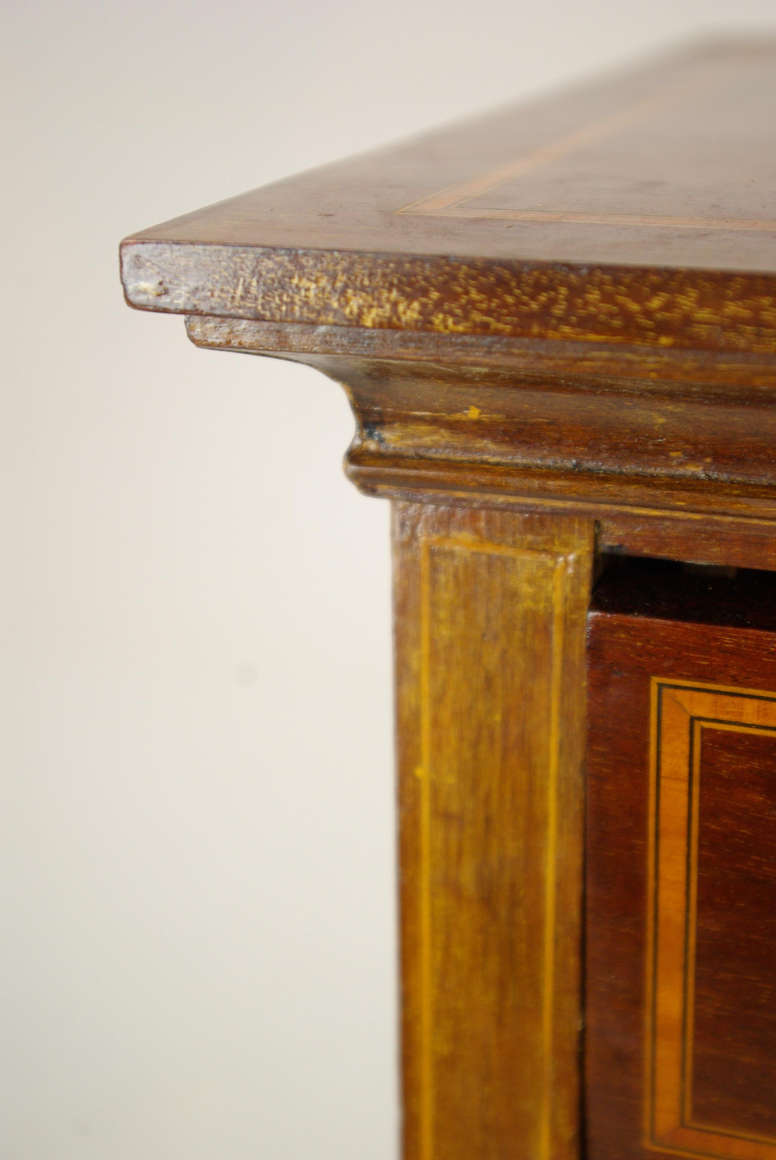 Sheet music cabinet, music storage, walnut cabinet, Scotland 1900, Antique Furniture, B1268.

Scotland 1900
Solid walnut with satinwood veneers
Original finish
Inlaid top
Four traditional fold down front sliding drawers
Original brass