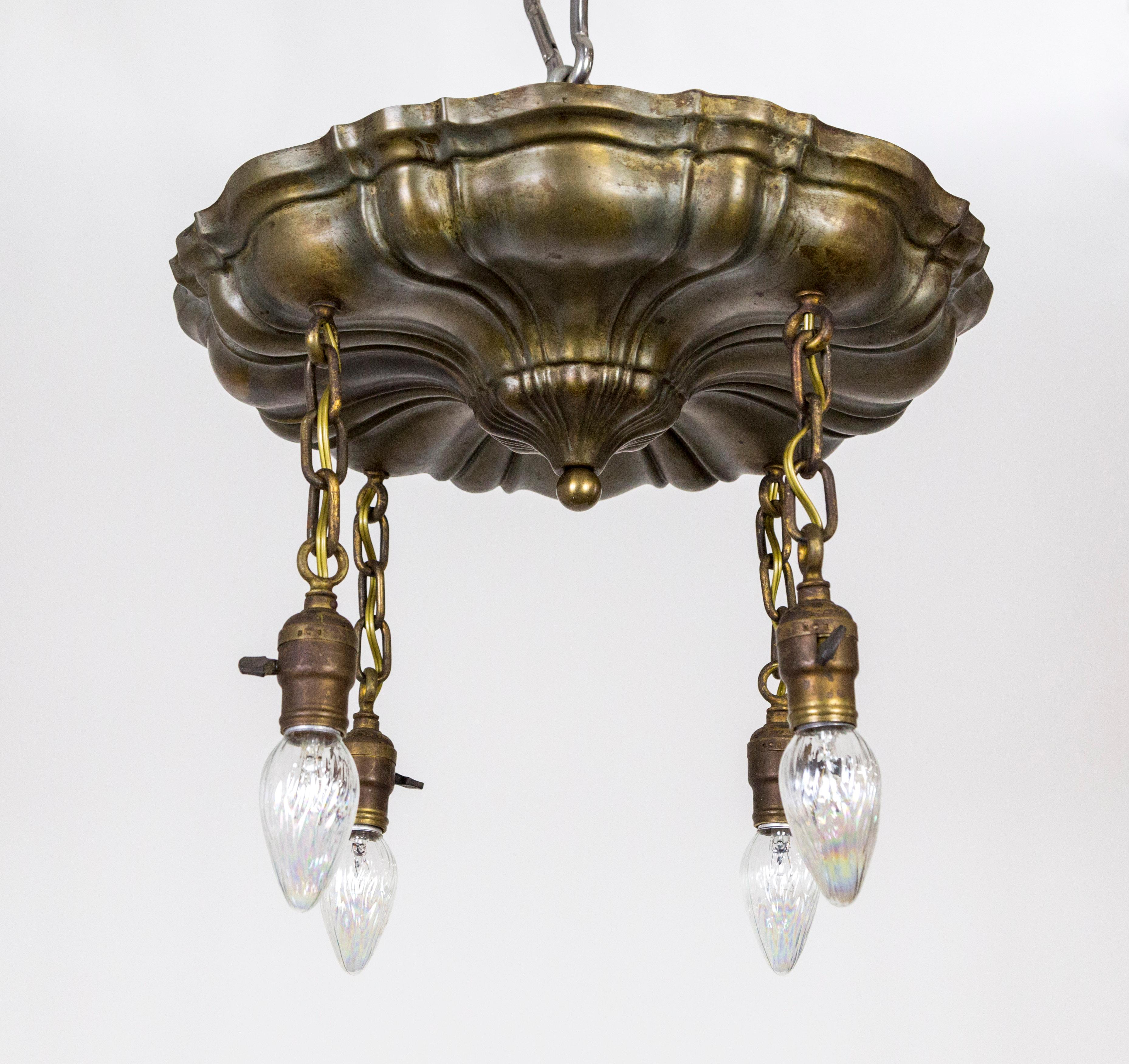 A period, Victorian, flush mount fixture with lovely lines in Sheffield style with refreshed patina. Has 4 hanging lights with switches on each socket. Newly wired. Measures: 11” height x 17” diameter.