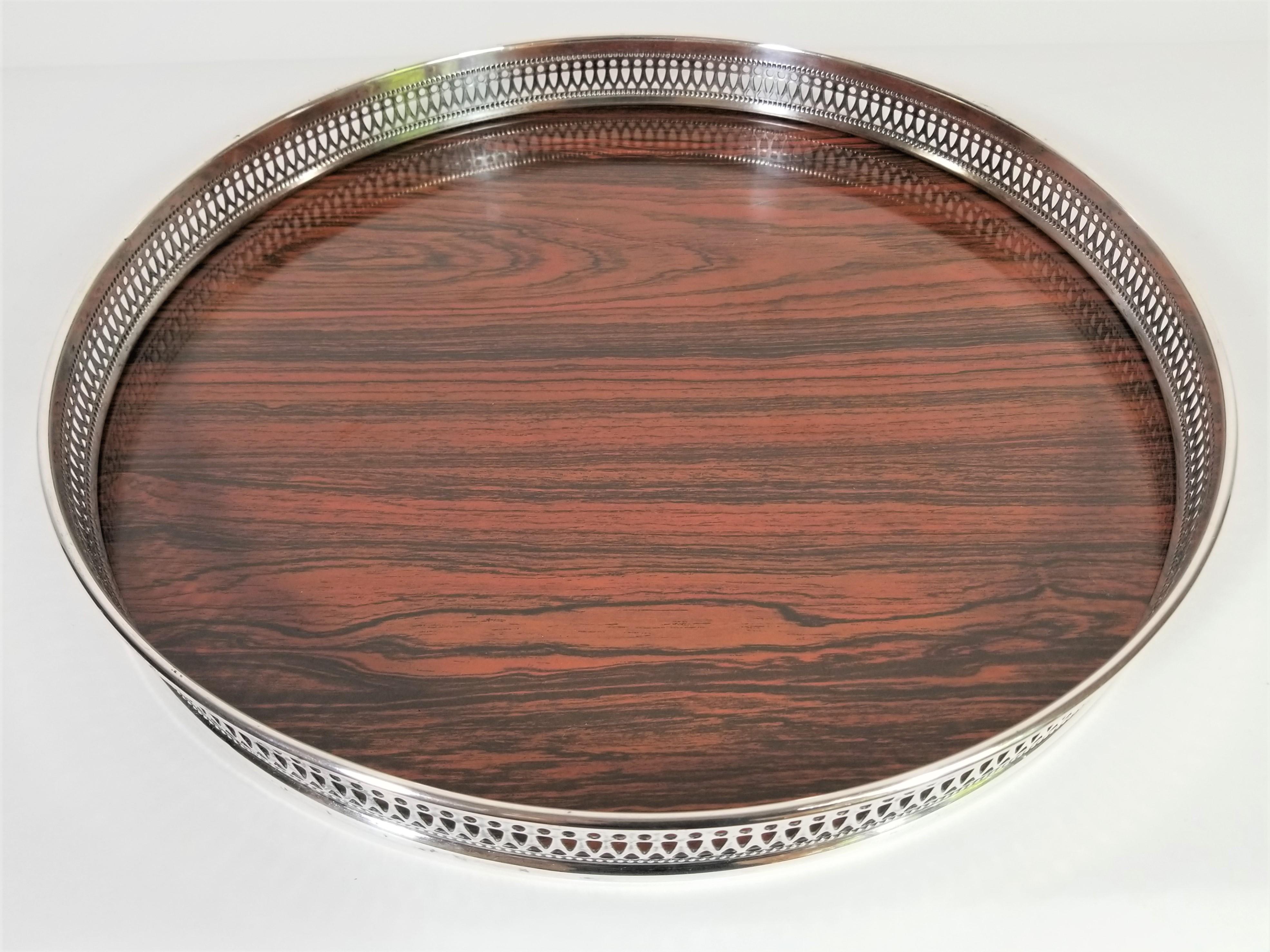 1960s midcentury Sheffield silver plate rim and rosewood like formica serving or bar tray.