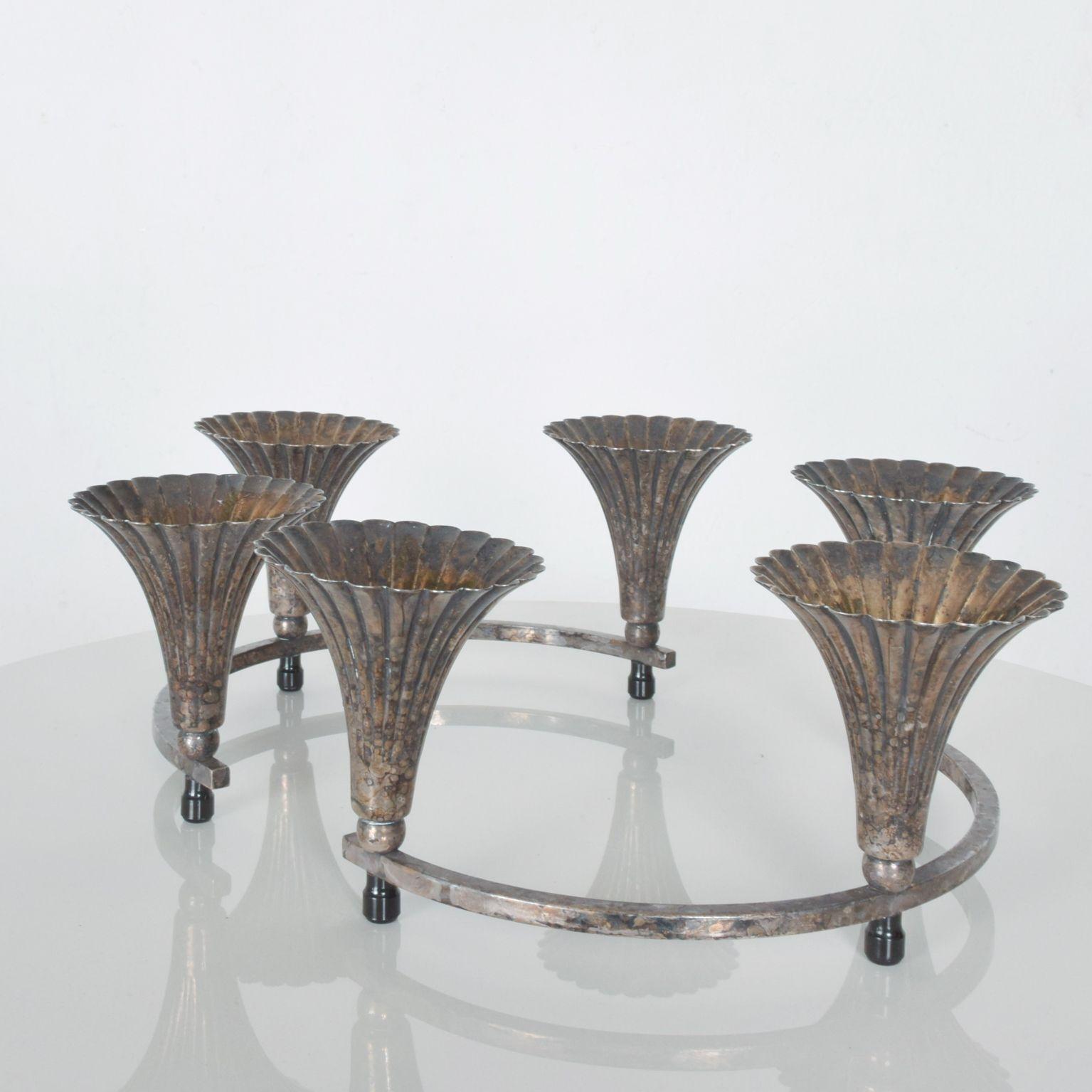 AMBIANIC presents
Sheffield Silver Co, Modern Vintage Circular Candelabra, 2 Candle Holder pieces that can form a lovely circular centerpiece with placement for 3 candles each candelabra. Sold as a set
Each semicircular candleholder has three