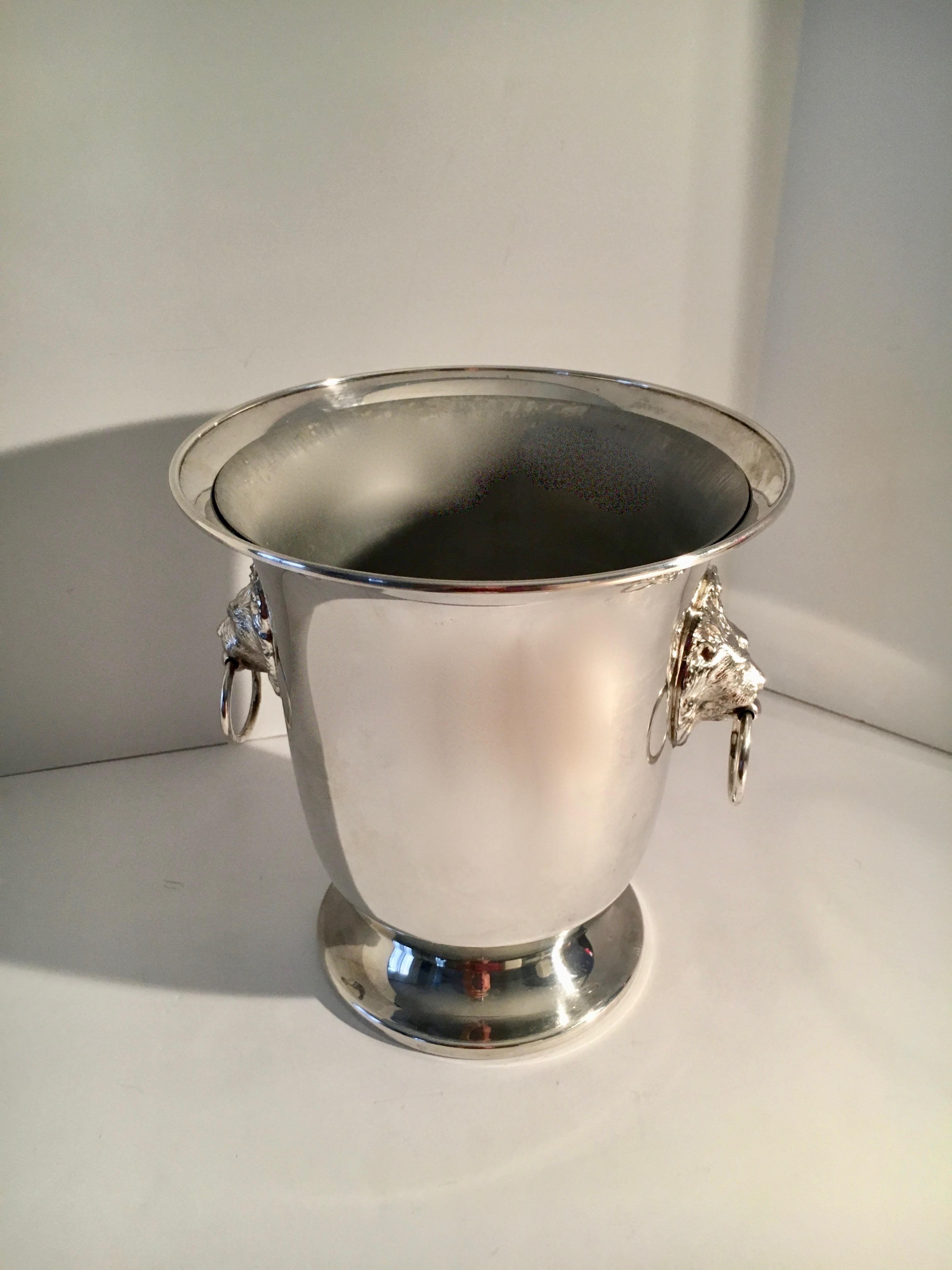 Sheffield silver plate champagne bucket with lion head handles - a stunning and impressive piece, ready for your next celebration. Carved lion head detailed handles for the most sophisticated bar!
Inside separate ice holder keeps your bar clean!