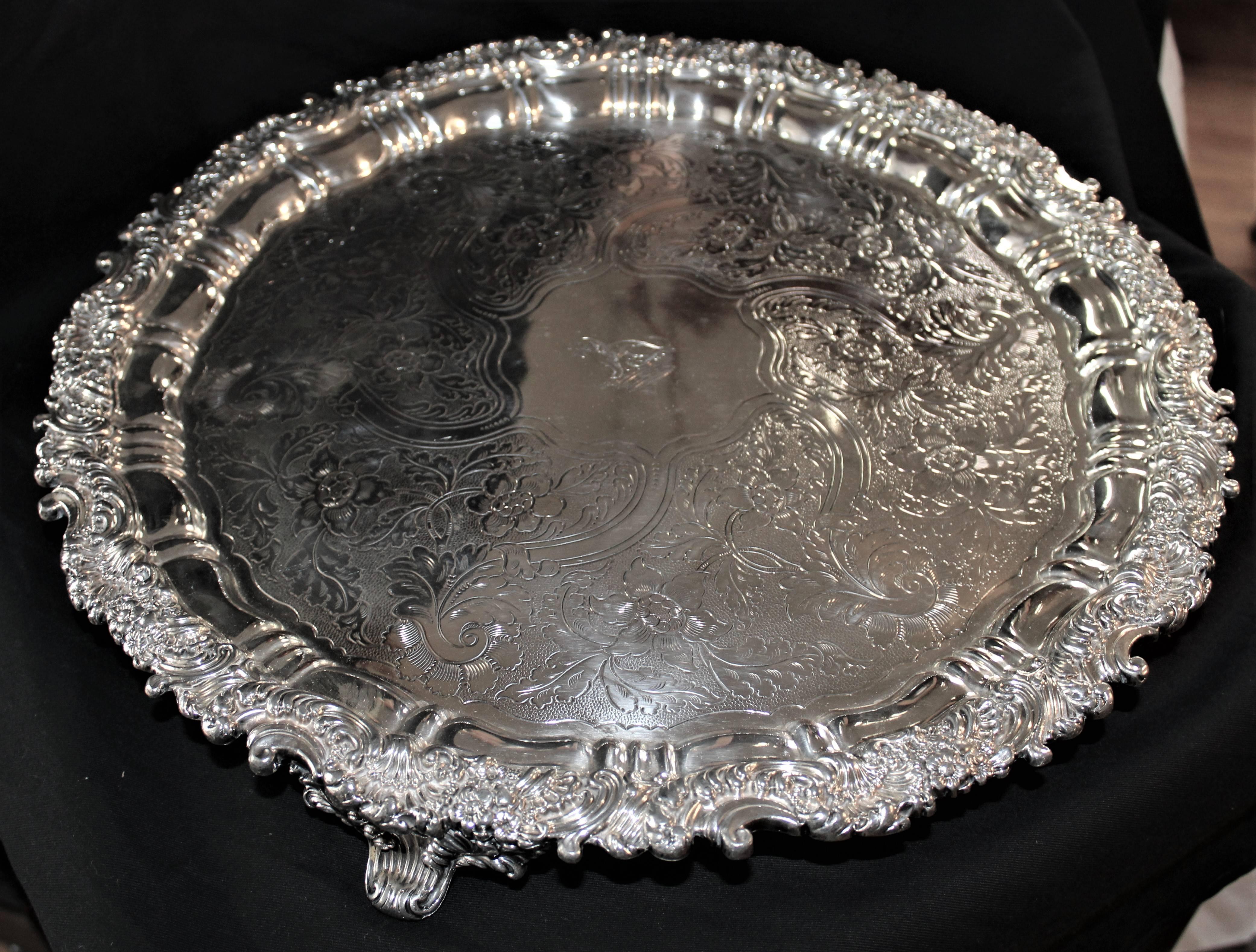 Large 18 inch oval Sheffield English footed silver over copper plated crested salver, circa 1810 with a cast edge.