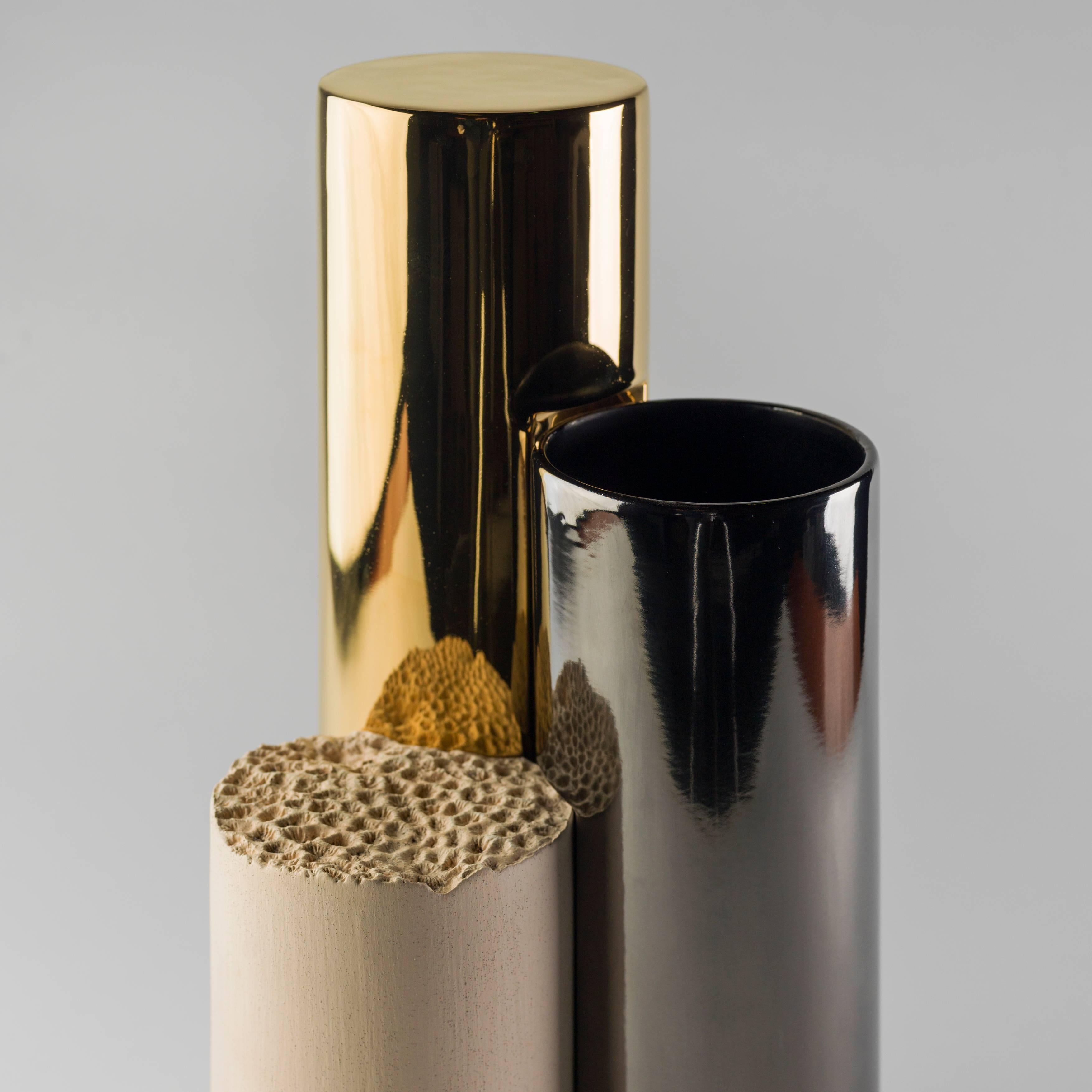 Is-Dher vases design by Sheikha Hind Bint Majid Al Qassimi.

24-carat gold-plated enameled ceramic vase, platinum and a beige engobe. 

Limited edition of eight units and two artist proofs and two prototypes.

Measure: 19 x 18 x 40 H