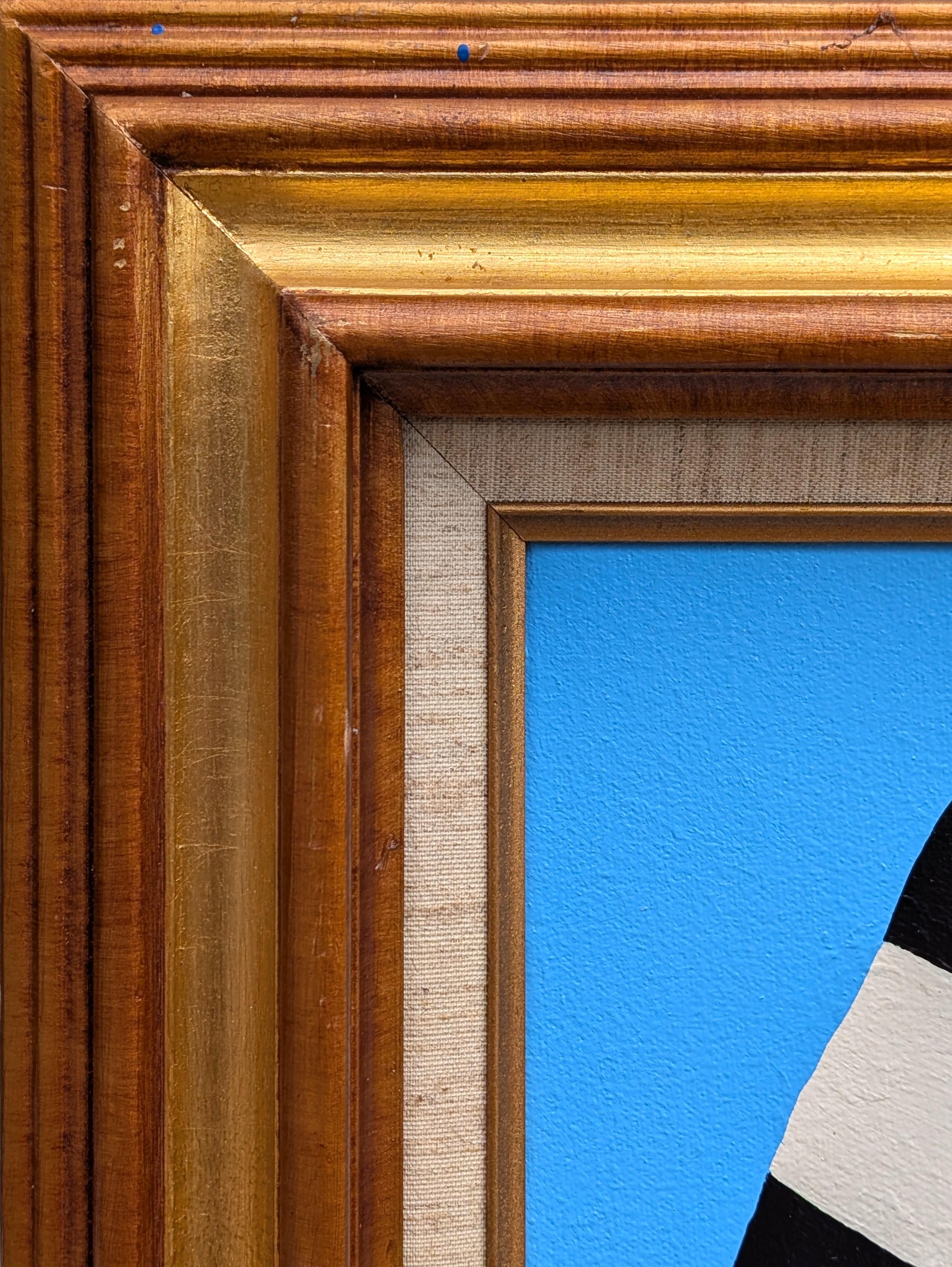 Contemporary colorful abstract painting by Houston based artist Shelbi Nicole. The work features a black and white shape floating against a light blue background. Signed and dated in the front lower right corner. Currently hung in a carved wood and