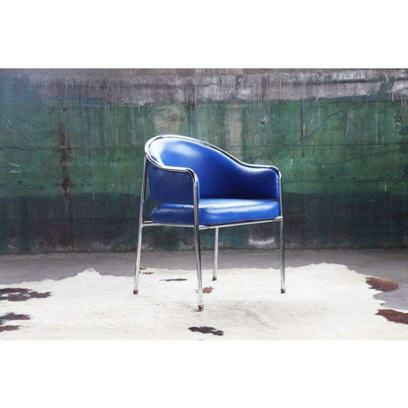 Post Modern / Mid Century Modern Vintage Original Chrome Arm Chairs by Iconic Shelby Williams circa the 1980's

This classic chair is a beauty. These chairs are POPPING. The chrome shines, the blue upholstery is a great color, and the design is