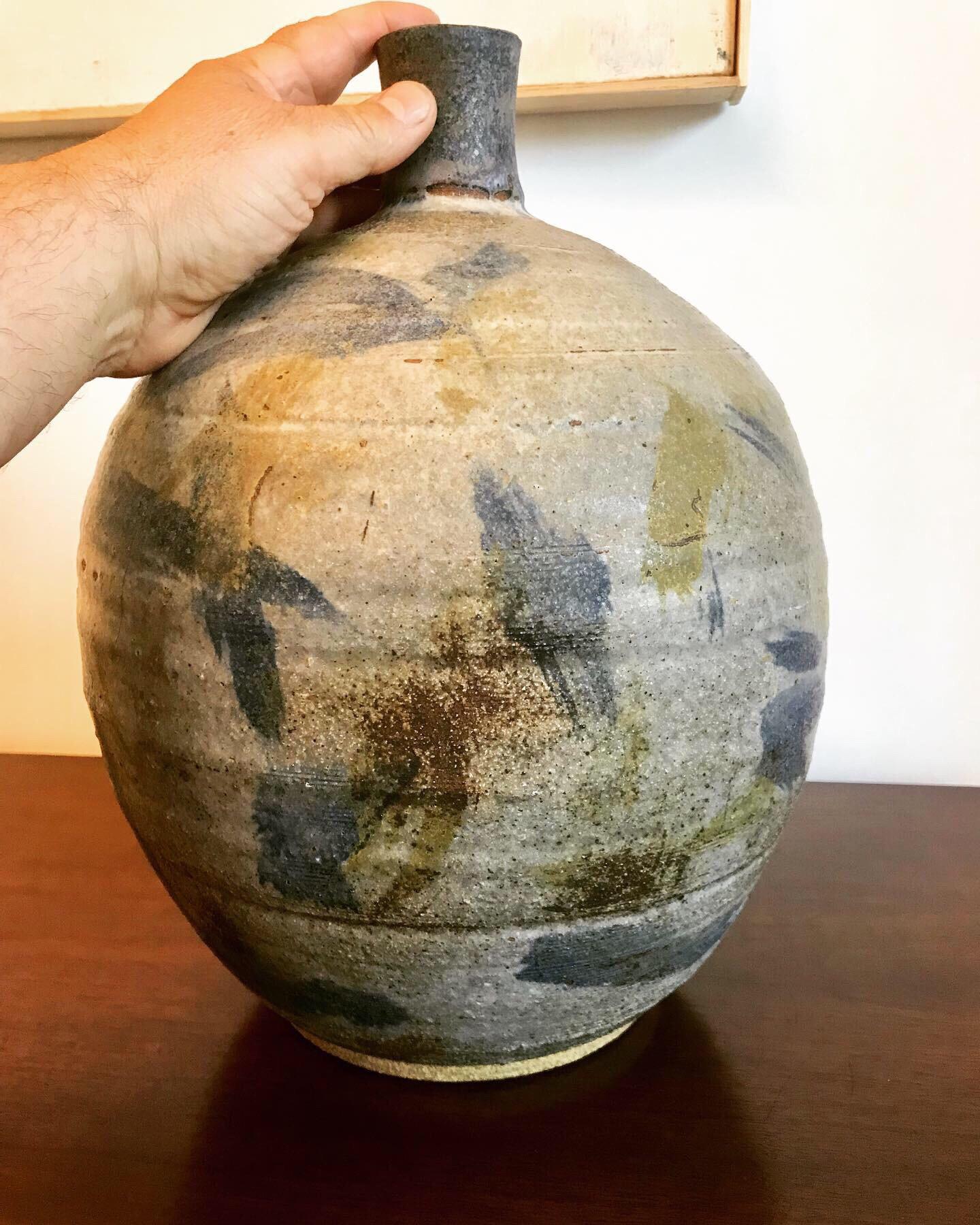 He was part of the California decorative design aesthetics of the 1960s-1970s, and is still presently active in his field.
This is an early piece, circa 1960s-1970s.
Wheel thrown clay with abstract Expressionist glaze pattern.
Signed 