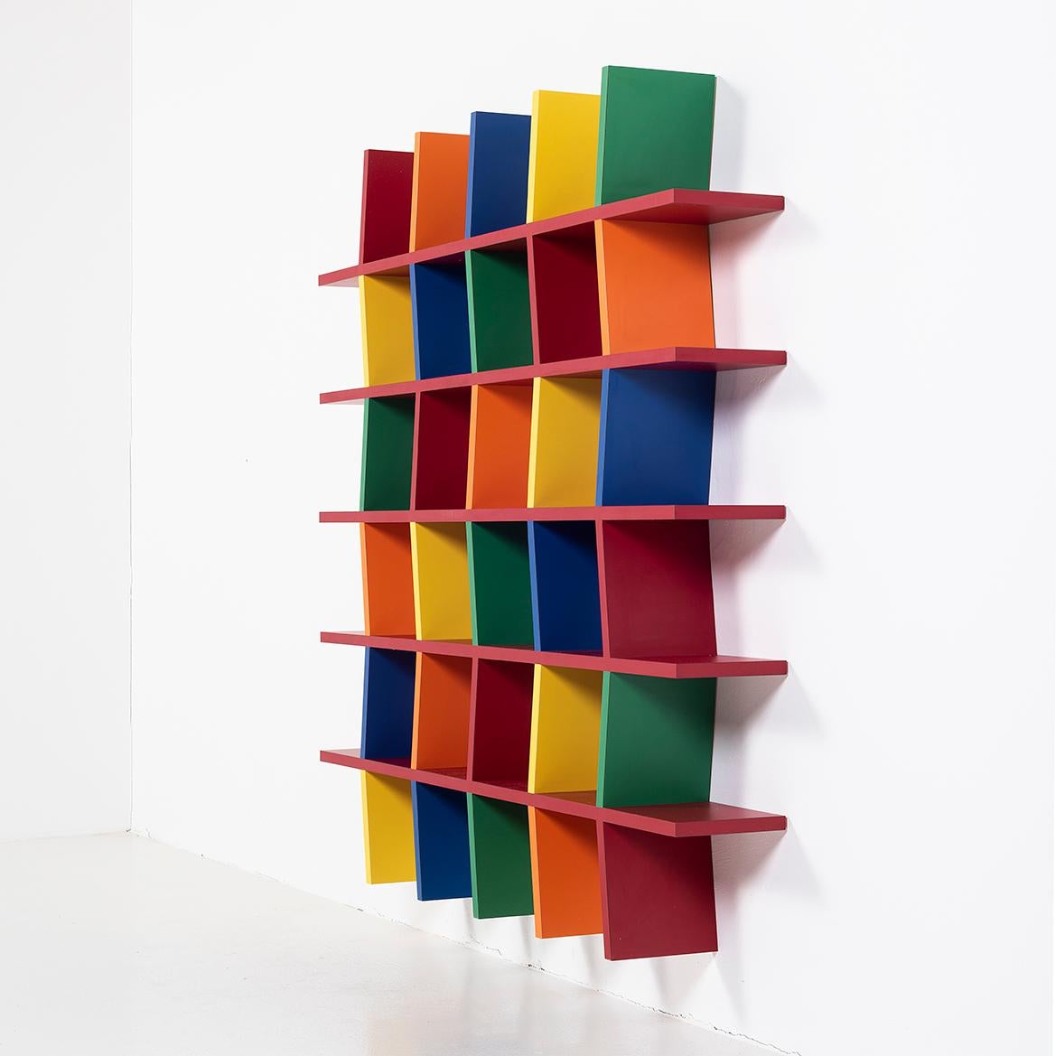 Designed by Shigery Uchida in 2000, SHELF 02 was part of a series shown in a exhibition that toured Tokyo, Nagoy and Sapporo.

As furniture, the design is simple, yet colors give different expressions.  The random arrangement of colors serves as a