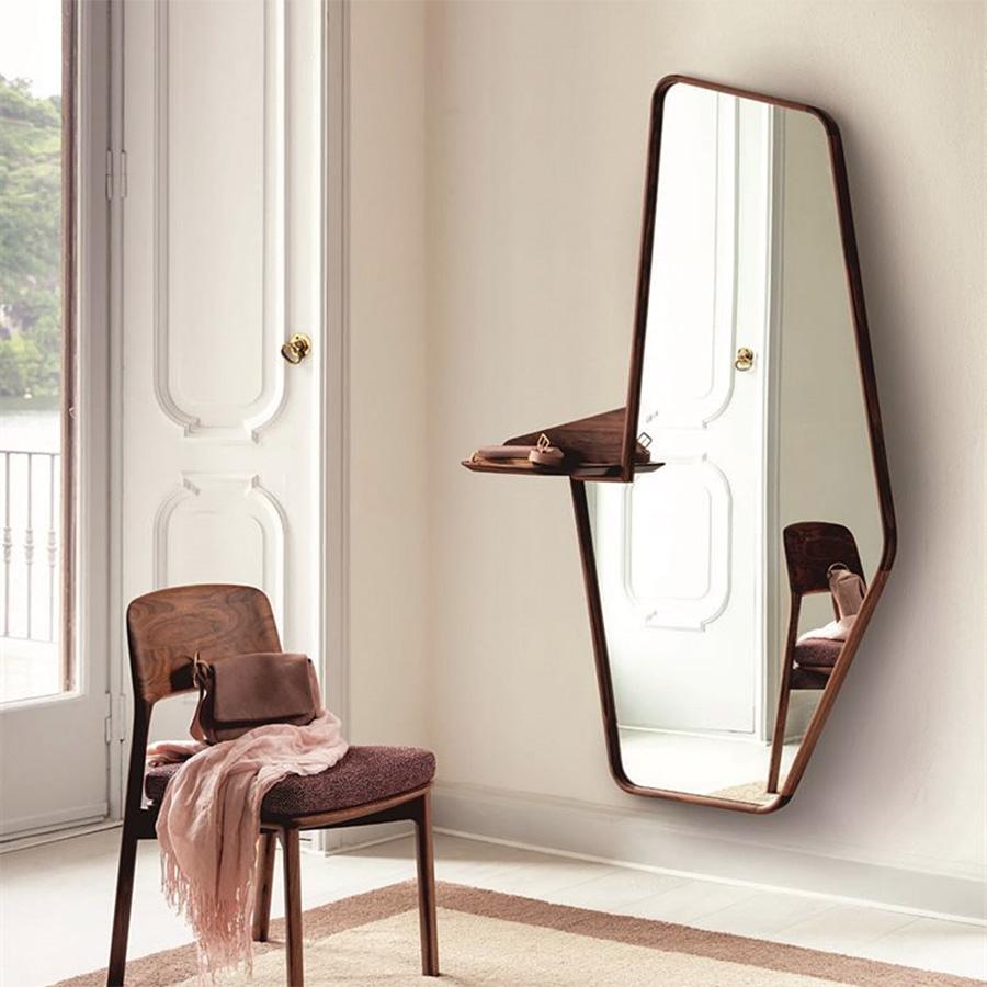 Mirror Shelfy Portrait with solid walnut wood 
frame and with 1 shelf in solid walnut wood. 
With clear mirror glass.