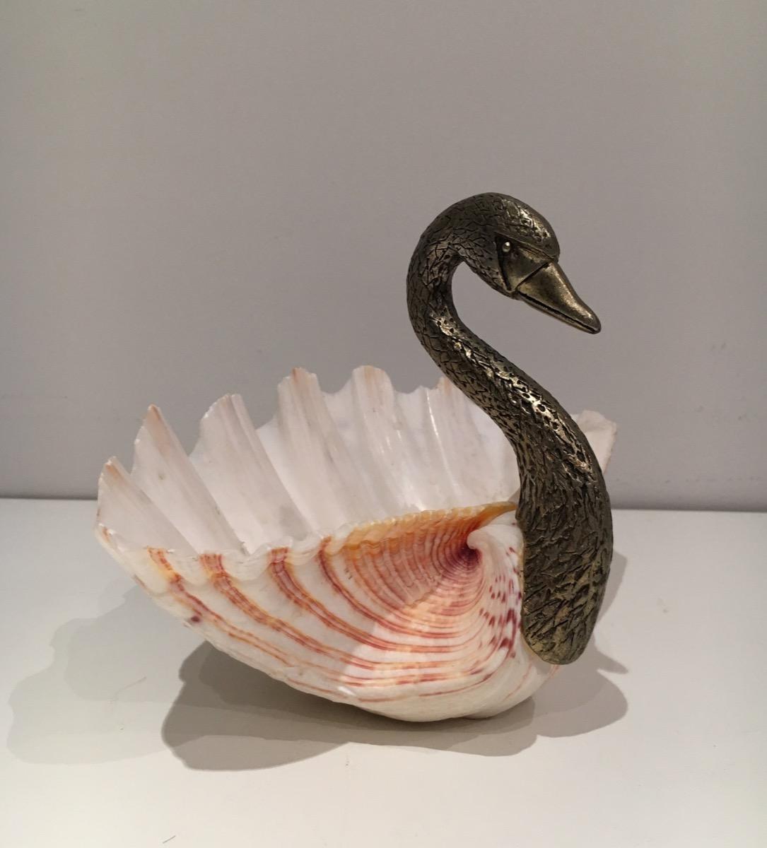 In the style of Maison Jansen. Shell and silver plated swan, French, circa 1970.