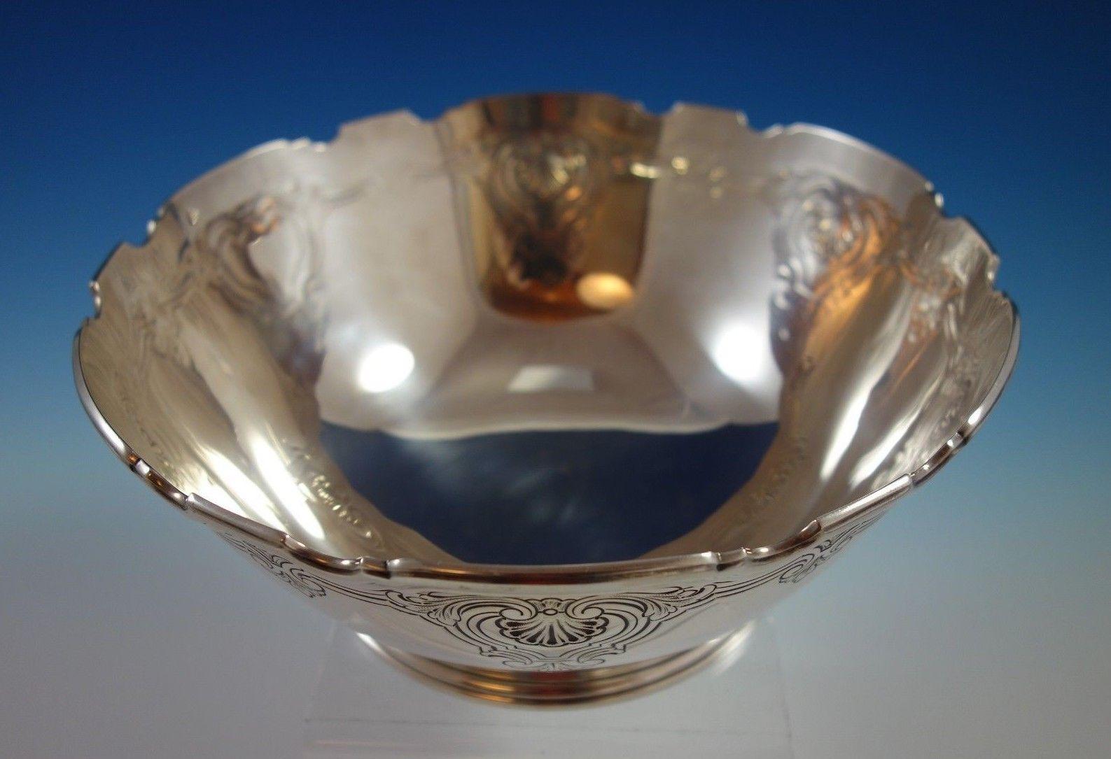 Shell and thread by Tiffany & Co.
Beautiful shell and Thread by Tiffany & Co. sterling silver fruit bowl. The piece is marked #22548H/8887 and stylized m date mark for 1907-47. The bowl measures 3 1/2 tall and 9 in diameter, and weighs 25.2 troy