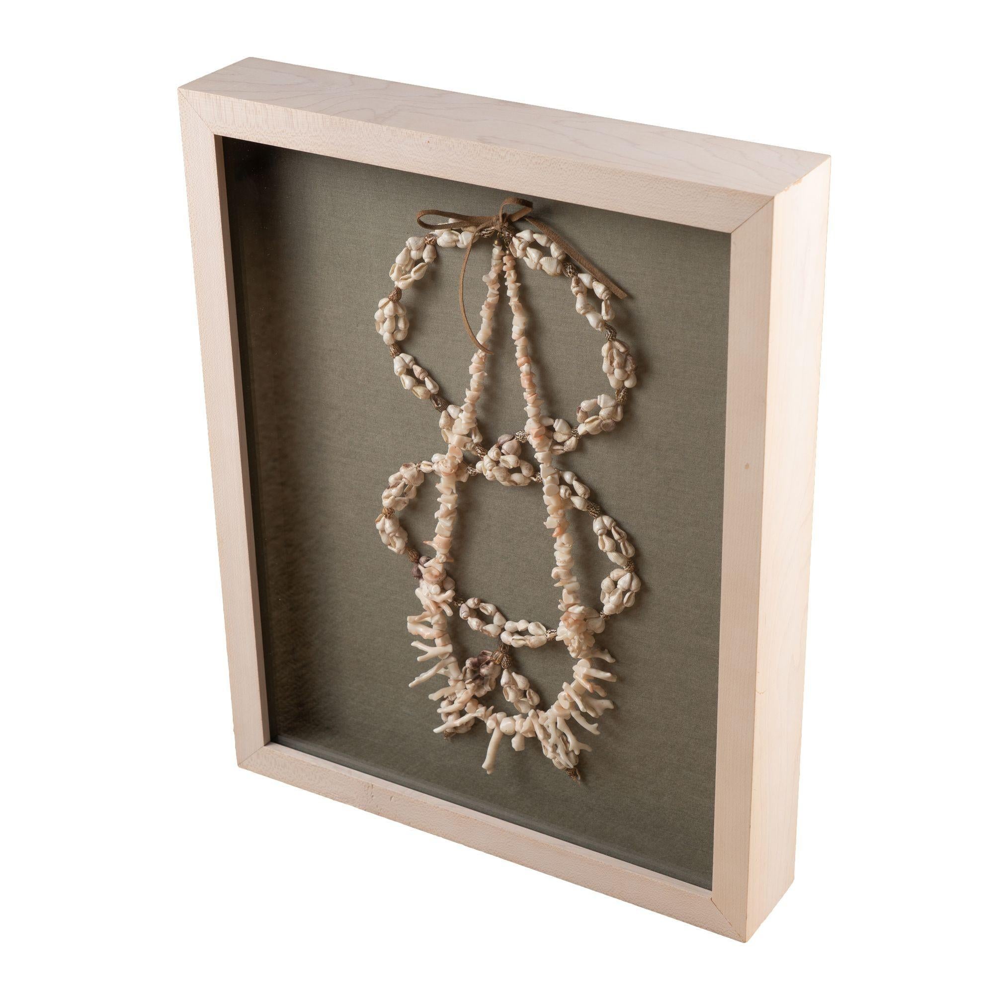 20th Century Shell and white branch coral necklaces mounted in a custom shadowbox For Sale