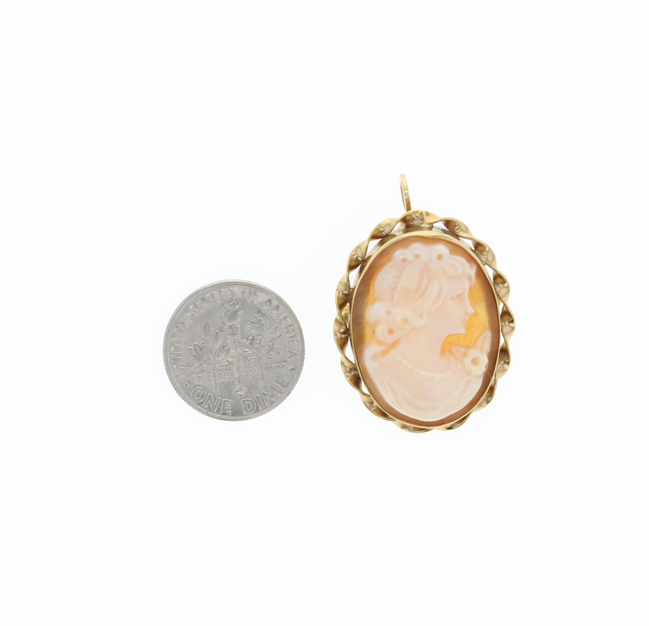 Vintage Shell Cameo Brooch/Pin Pendant with Oval Gold Tone Frame and Carved Shell Victorian Woman Profile 

A historical classic turned modern trend. Once revered as a symbol of status, this vintage-inspired work of art is the face of fashion today.