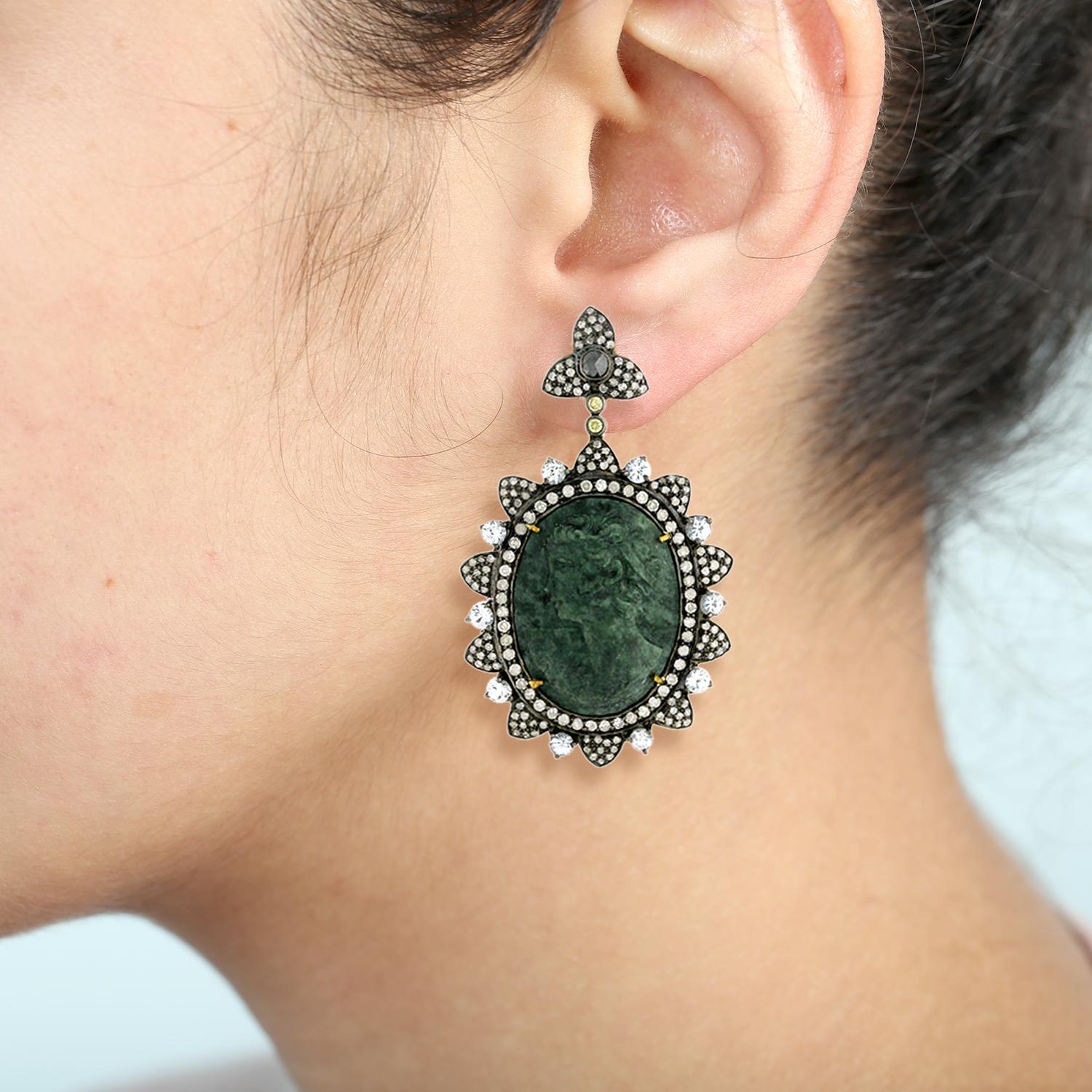 Elevate your style with our stunning Shell Cameo Earrings, expertly crafted from 18k Gold & Silver. Adorned with sparkling Sapphire & Pave Diamonds, these earrings are a perfect blend of classic beauty and contemporary glamour.