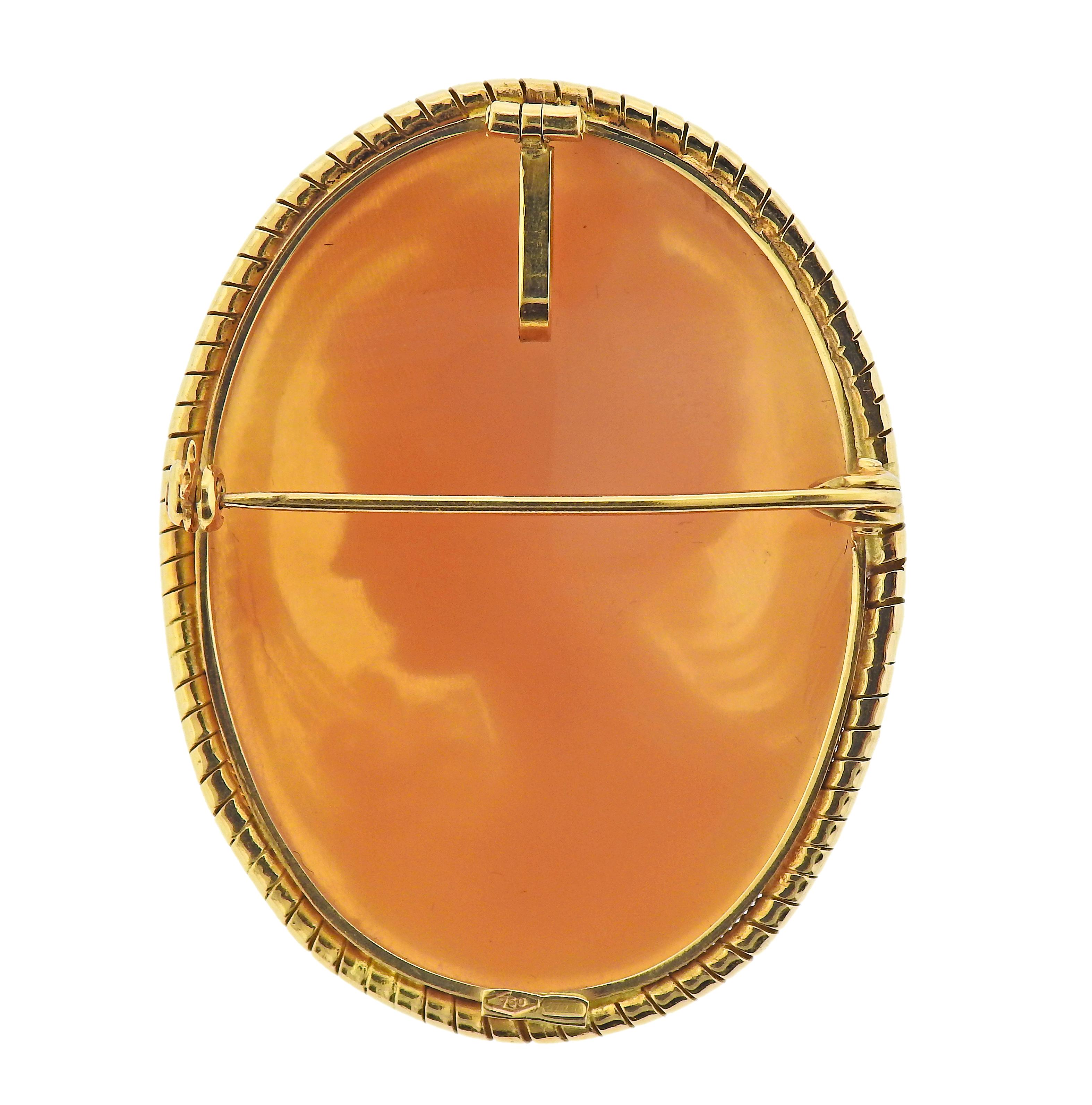 18k yellow gold pendant brooch, with shell cameo, depicting a lady's profile. Brooch is 45mm x 35mm. Marked 750. Weight - 12 grams. 