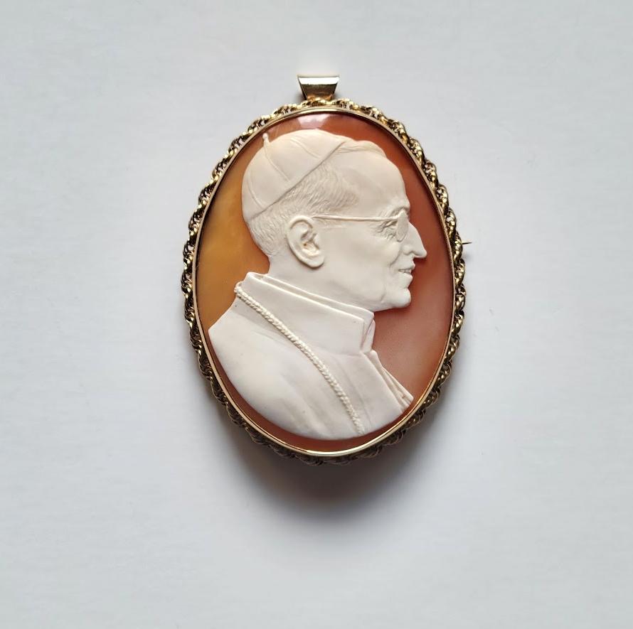 Catholic Historical Relic, Very Rare Carved Shell Cameo Pope Pius XII In 14K Solid Gold Frame.

We present you with one of the most rare and unique cameos. This cameo is not only a collector's item and a piece of jewelry art but also has a