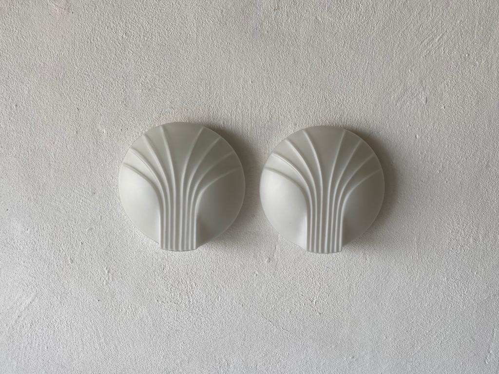 Very rare shell design opal glass pair of sconces by Hillebrand, 1960s, Germany

Minimalist high quality design

Lamps are in very good vintage condition.
Wear consistent with age and use

These lamp works with E14 standard light bulb. Max