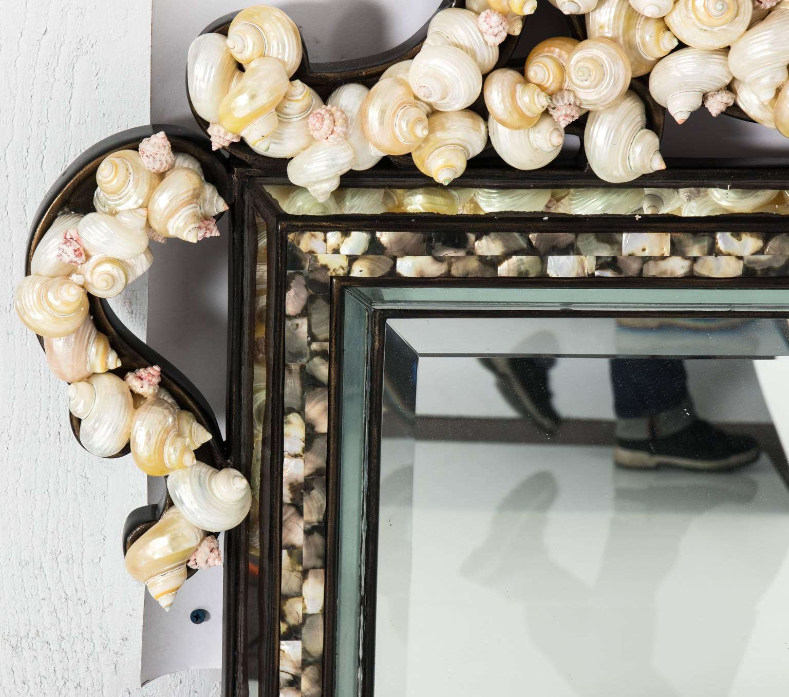 Contemporary shell encrusted Rococo style mirror by La Barge.
 