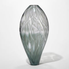 Shell Flower, a handblown grey & clear glass vessel by Michèle Oberdieck