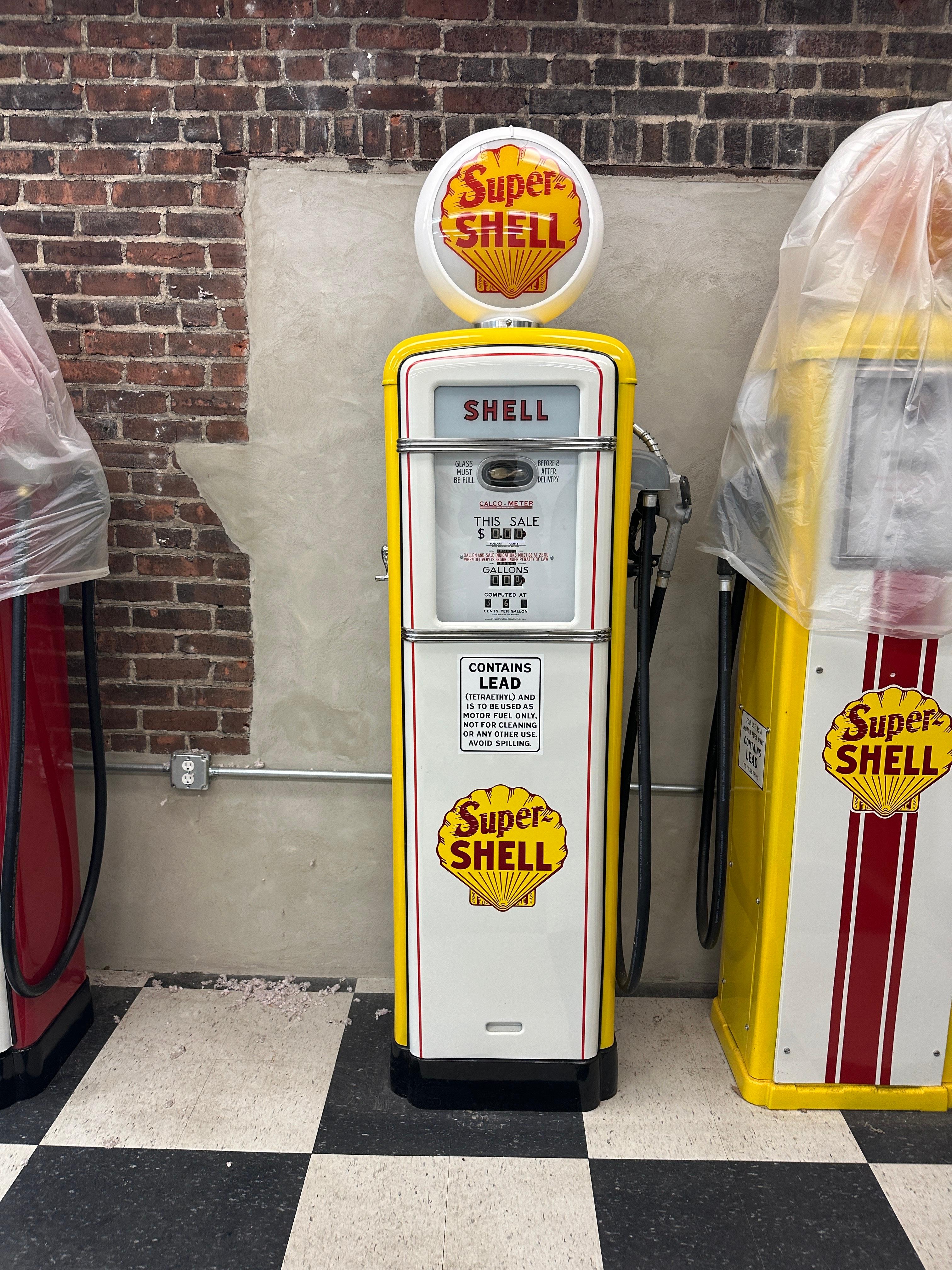 This vintage Gilbarco Shell Gas Pump is in very good condition. This pump has been fully restored. Lighting elements are operational, pump elements have been removed.