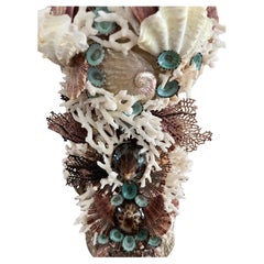 Shell grotto candle, flower holder, for indoor, protected outdoor space.