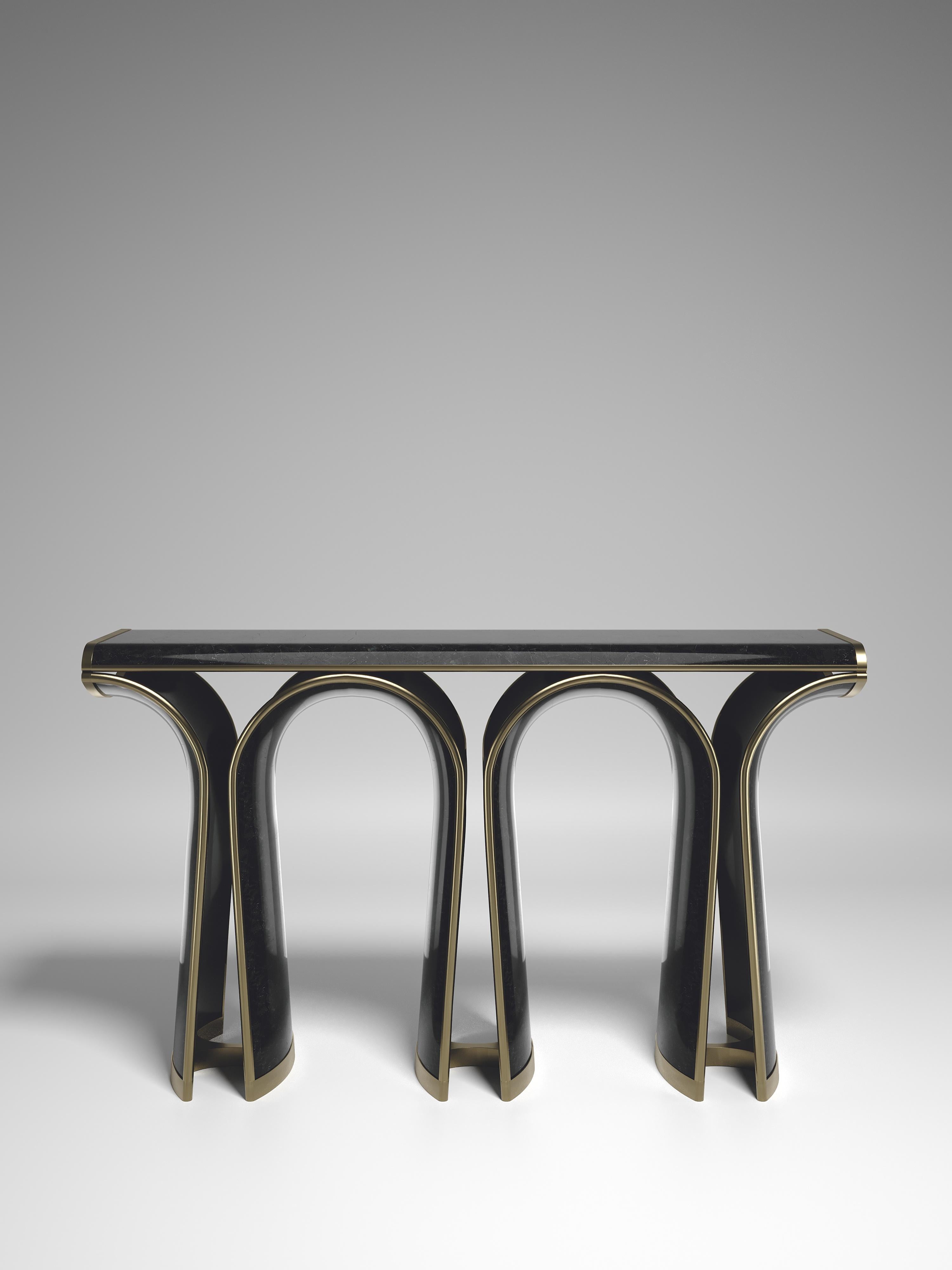 The Nymphea console by R&Y Augousti in black pen shell with bronze-patina brass details explores the brand's iconic DNA of bringing old world artisanal craft into a contemporary and utterly luxury feel. Available in other finishes. Custom