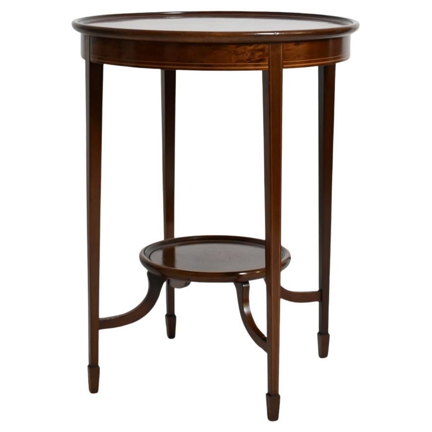 Table d'appoint ronde en marqueterie de coquillages, C.I.C.