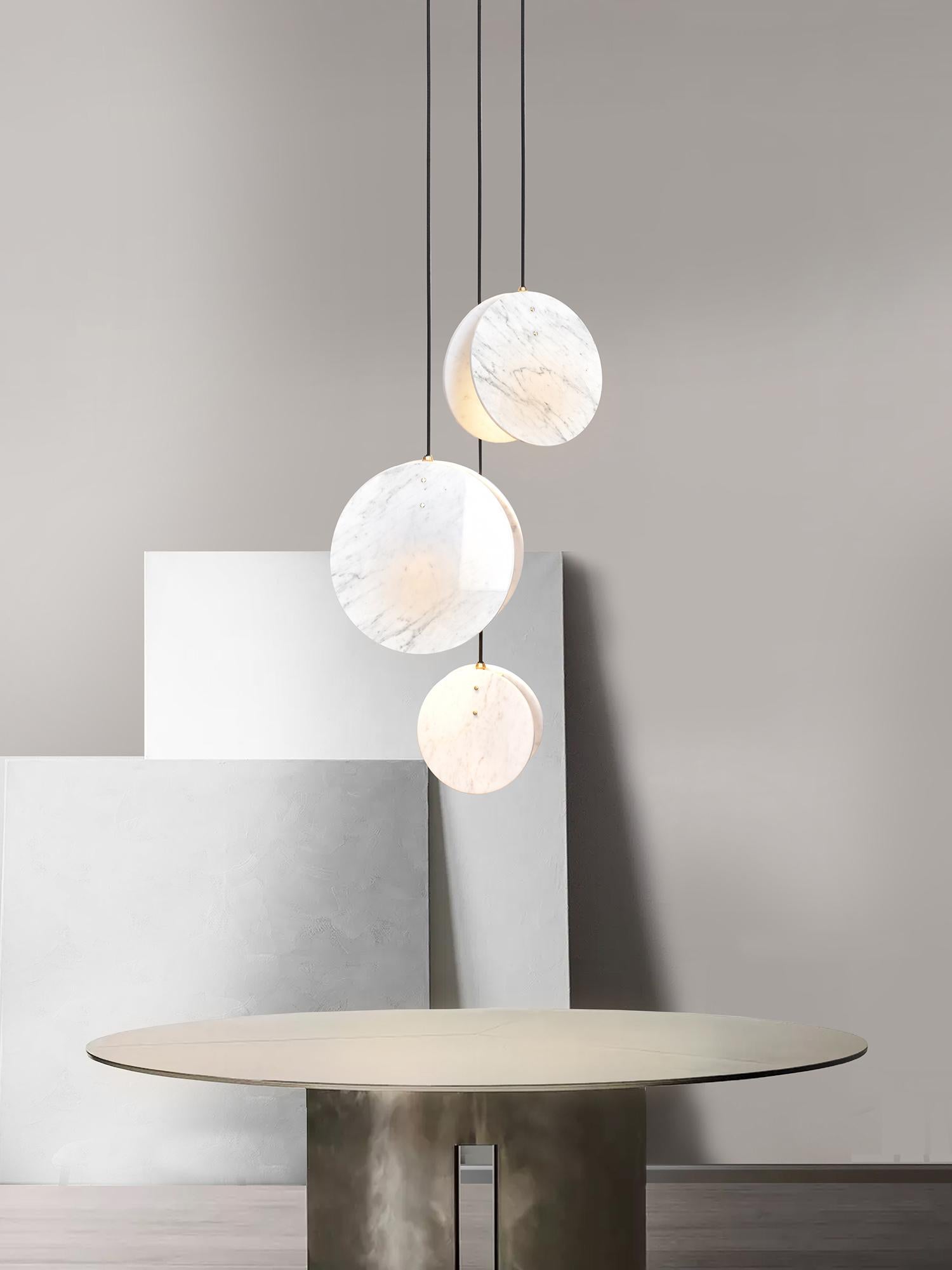 Inspired by our love for the British coastline and beaches. Made from a solid brass lamp housing, enclosed in two Carrara marble discs to create a soft, directional light source.

Lamp - GU10 (spotlight)