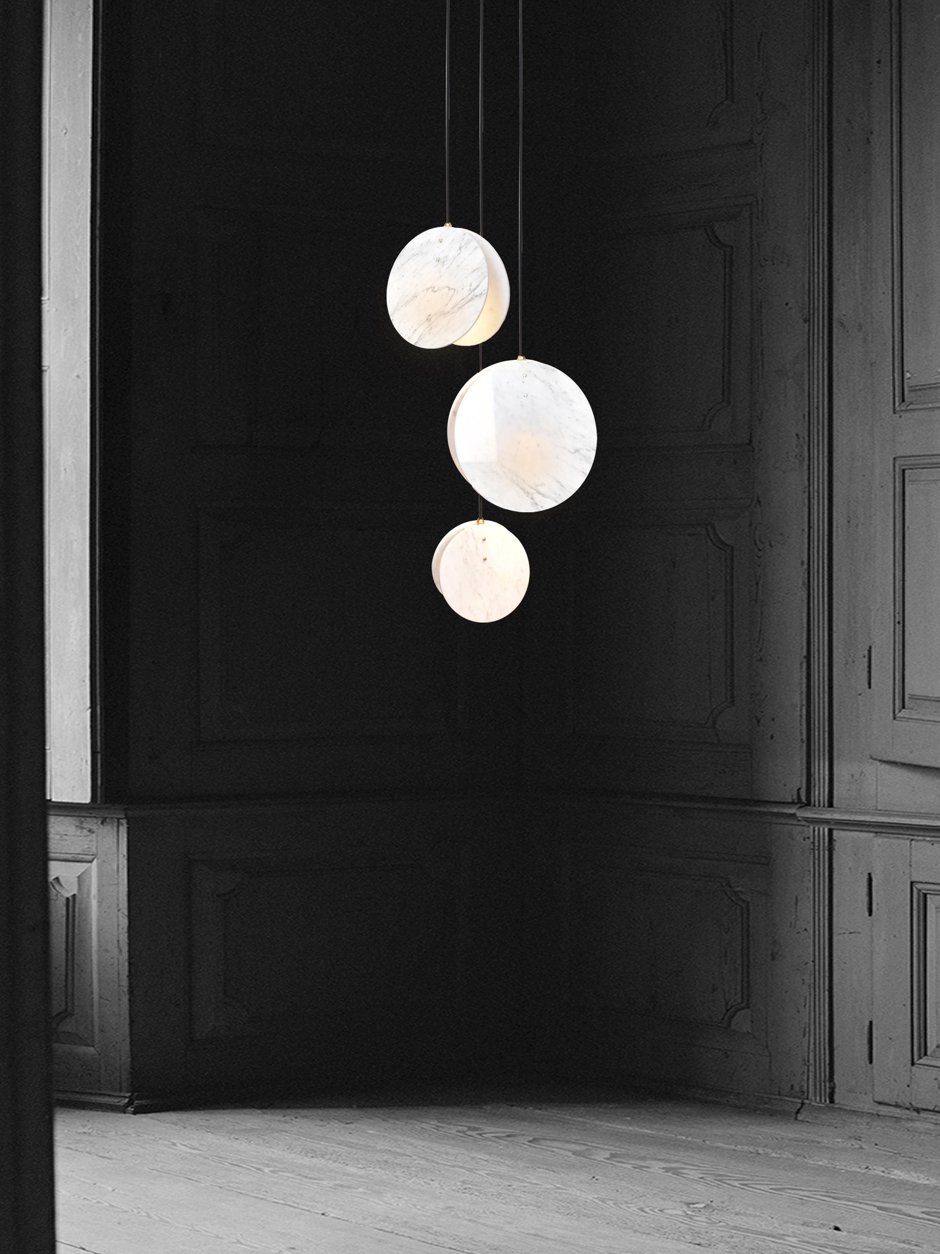 Inspired by our love for the British coastline and beaches. Made from a solid brass lamp housing, enclosed in two Carrara marble discs to create a soft, directional light source.

Lamp - GU10 (spotlight)