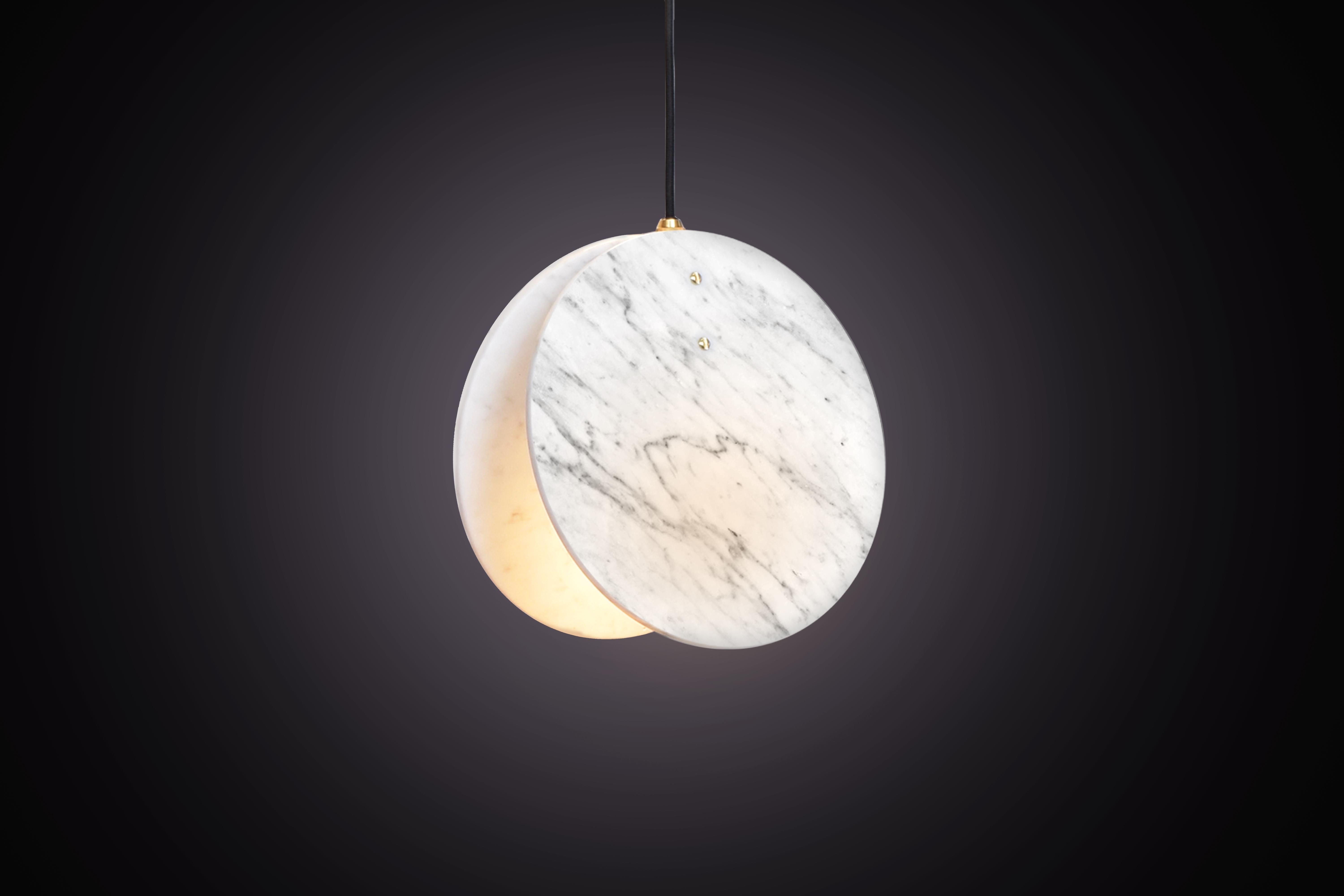 Inspired by our love for the British coastline and beaches. Made from a solid brass lamp housing, enclosed in two Carrara marble discs to create a soft, directional light source.

Lamp - GU10 (spotlight).