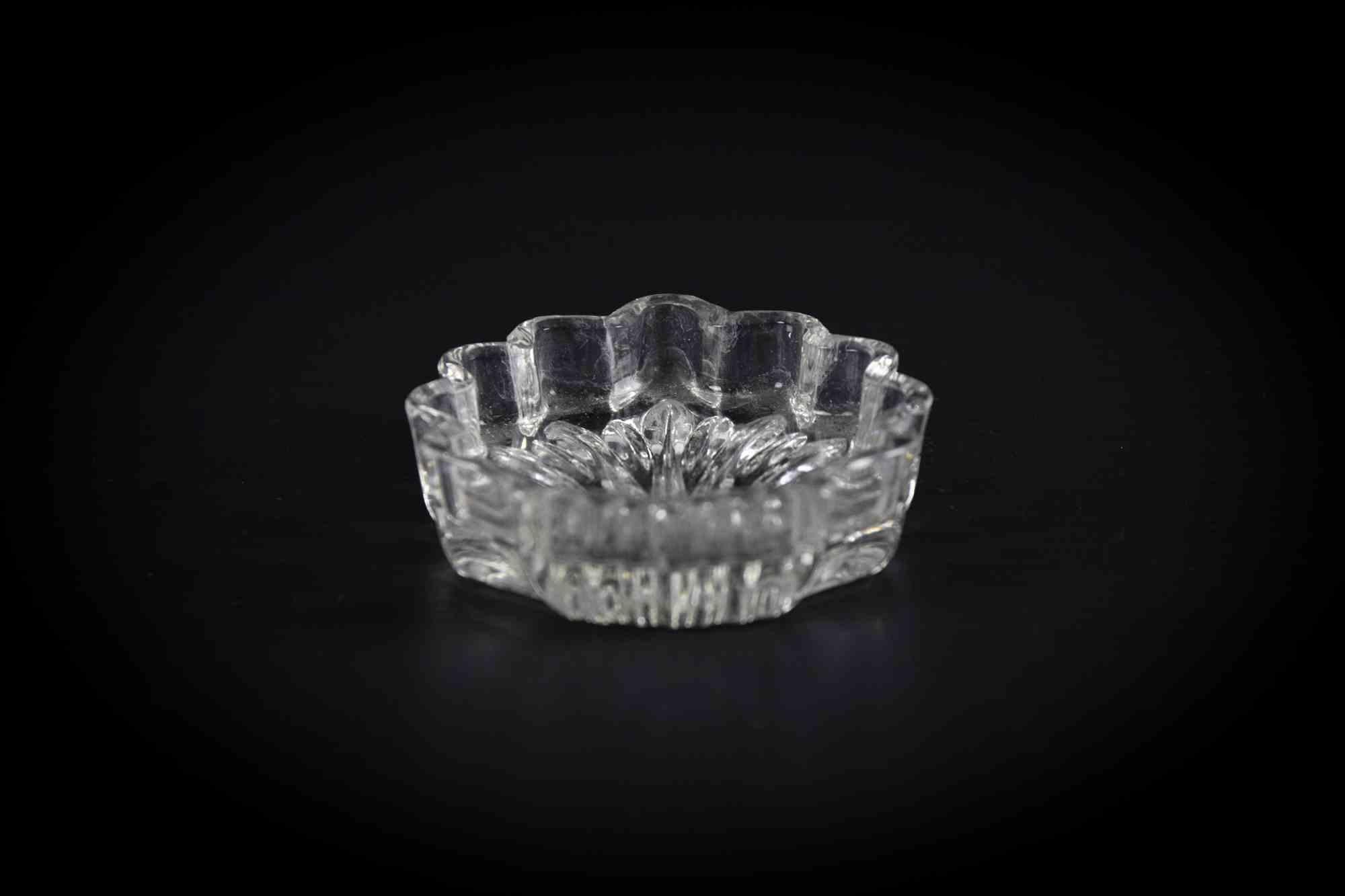 Shell shape vintage ashtray is an original decorative object realized in the mid-20th century.

Original art glass.

Made in Italy.

Dimensions: 10 x 8 cm. 

Perfect conditions.