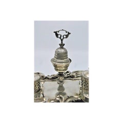 Shell-shaped silver inkwell w/ two tanks, bell & standing on three hollow feet