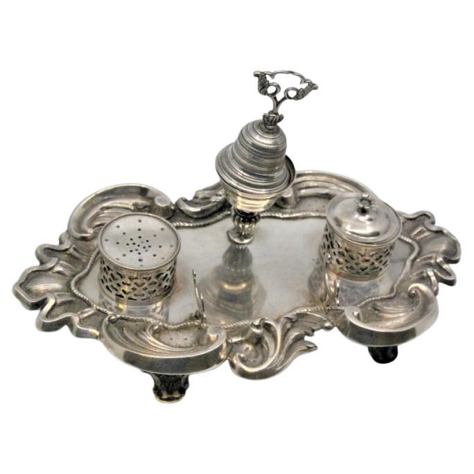 Shell-shaped silver inkwell w/ two tanks, bell 
standing on three hollow feet For Sale