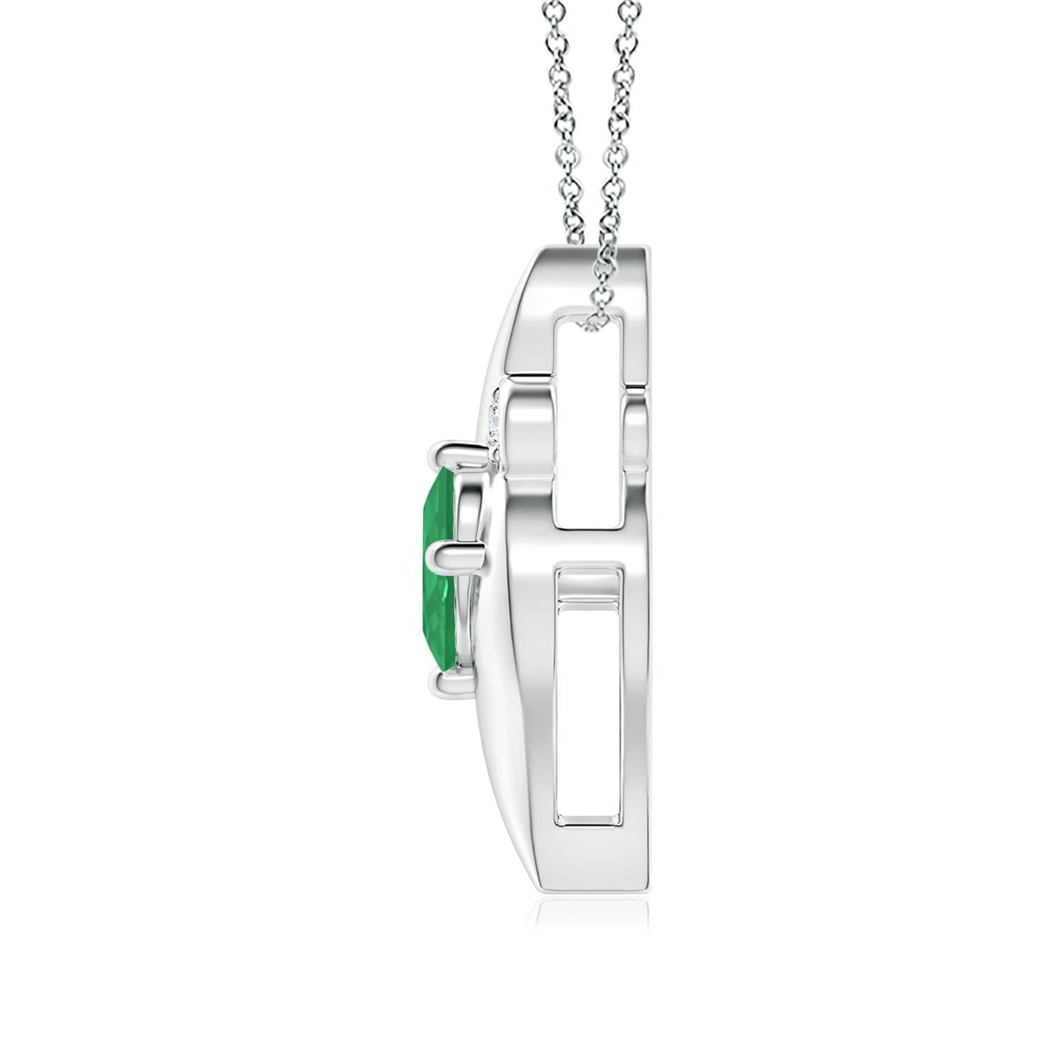 Questo splendido ciondolo presenta una seducente cornice a forma di conchiglia che racchiude uno smeraldo verde intenso. Gli scintillanti accenti di diamanti rotondi aggiungono al fascino complessivo del design. Questo ciondolo ovale con smeraldo e