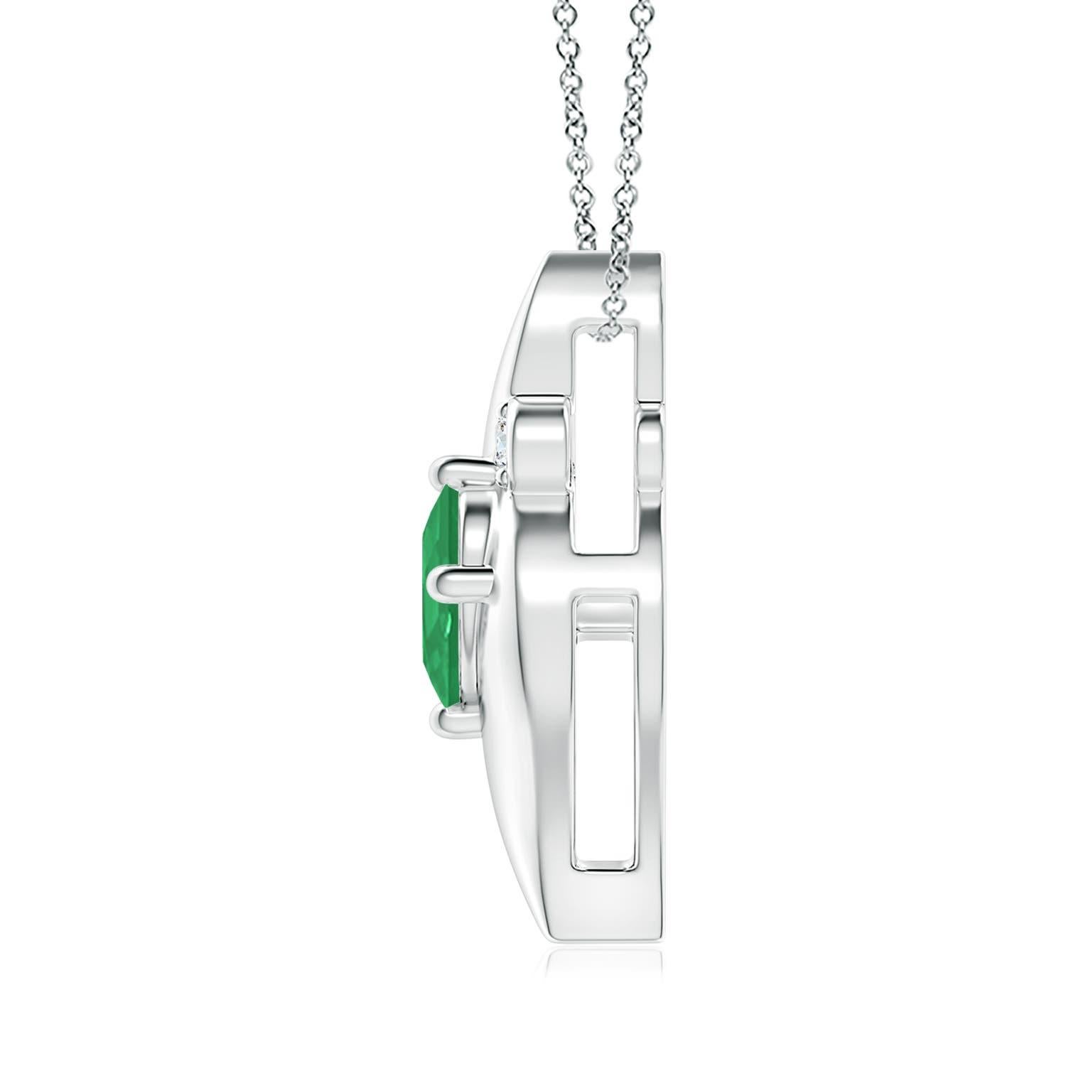 Questo splendido ciondolo presenta una seducente cornice a forma di conchiglia che racchiude uno smeraldo verde intenso. Gli scintillanti accenti di diamanti rotondi aggiungono al fascino complessivo del design. Questo ciondolo ovale con smeraldo e