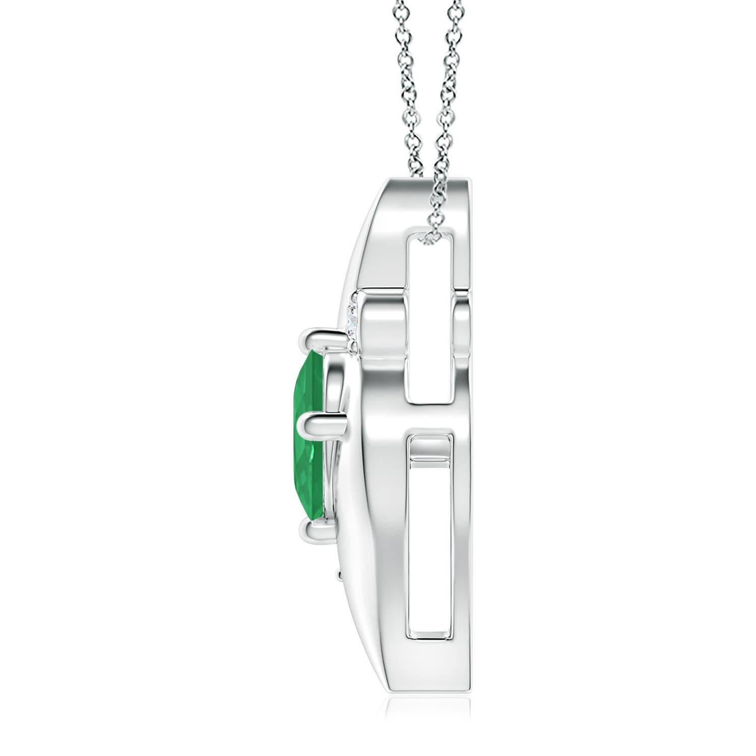 Questo splendido ciondolo presenta una seducente cornice a forma di conchiglia che racchiude uno smeraldo verde intenso. Gli scintillanti accenti di diamanti rotondi aggiungono al fascino complessivo del design. Questo ciondolo ovale con smeraldo e