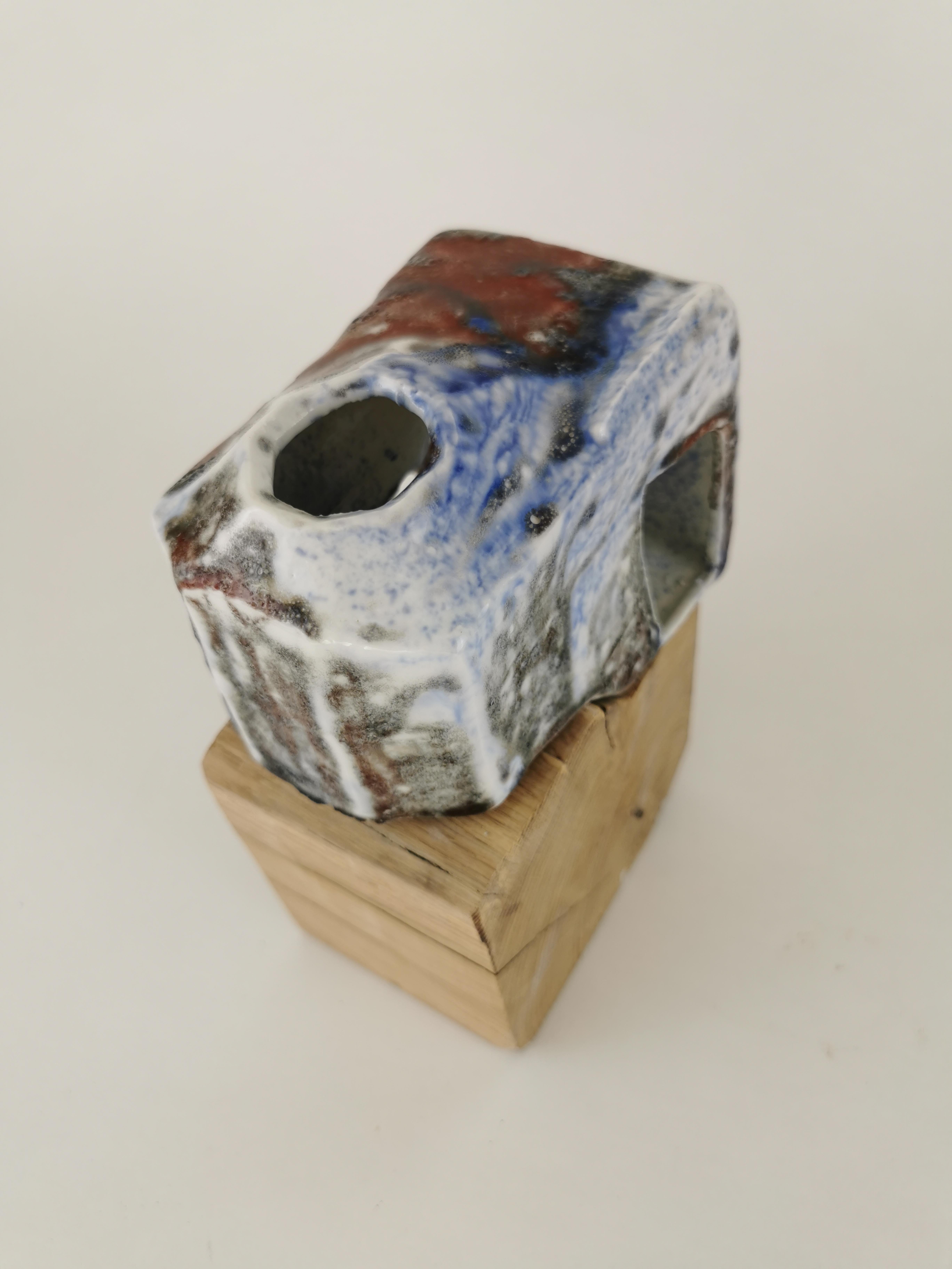Shelter IV Decorative Object by Dora Stanczel
One of a Kind.
Dimensions: D 9 x W 14 x H 11 cm.
Materials: Porcelain, colored glaze and gold.

Dimensions are variable. A wooden stand can be included. Please contact us.

I create bespoke and luxurious