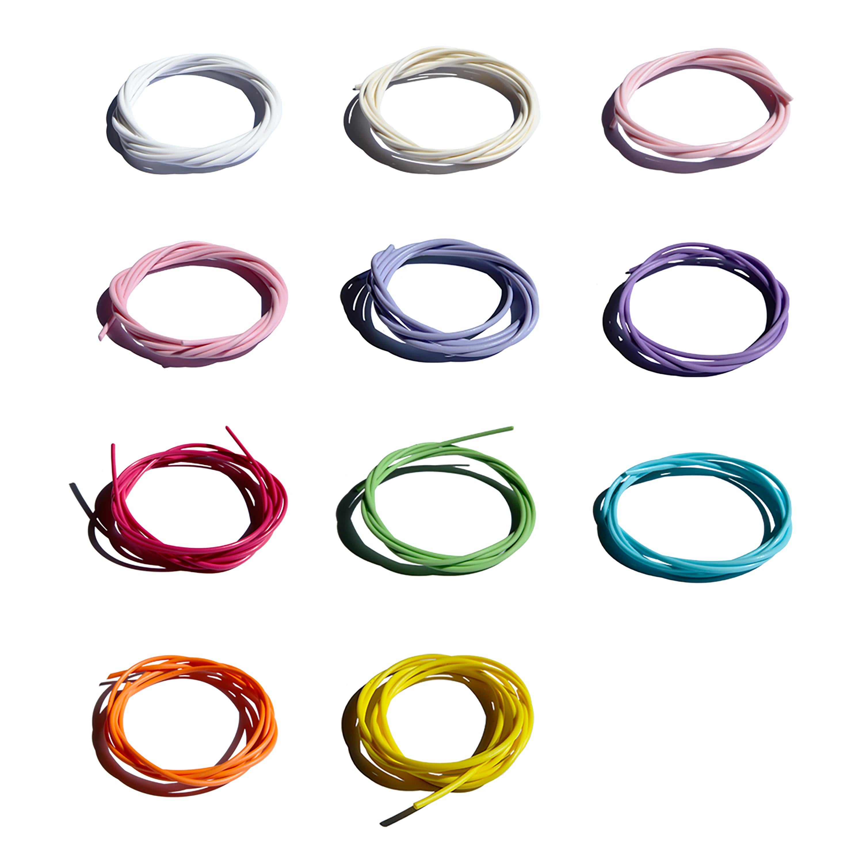 Shelter table light created by Ango, takes as its starting point the elemental and universal form of a loosely woven nest-like home, which is then incarnated by light diffused through many metres of lateral coloured filament. 

Each colour in