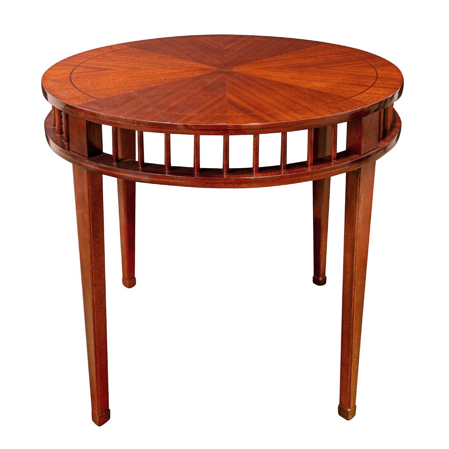 Beautifully crafted round side table with radiating pattern on top in mahogany with inlays by Shelton-Mindel for Luten-Clarey-Stern (LCS), American 1990's.  This table is stunning.